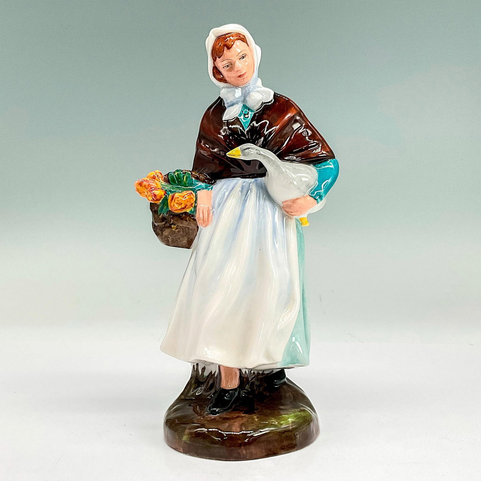 Country Lass HN1991A - Royal Doulton Figurine: Artist: Leslie Harradine Dimensions: 7.25"H Issued: 1975 - 1981 Manufacturer: Royal Doulton Country of Origin: England