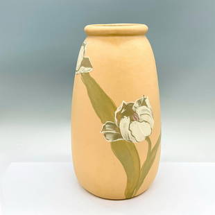 Weller Pottery Floral Vase, Tulip: A large yellow vase adorned with hand painted white tulips. Issued: 20th century Dimensions: 7"W x 12"H Manufacturer: Weller Country of Origin: United States