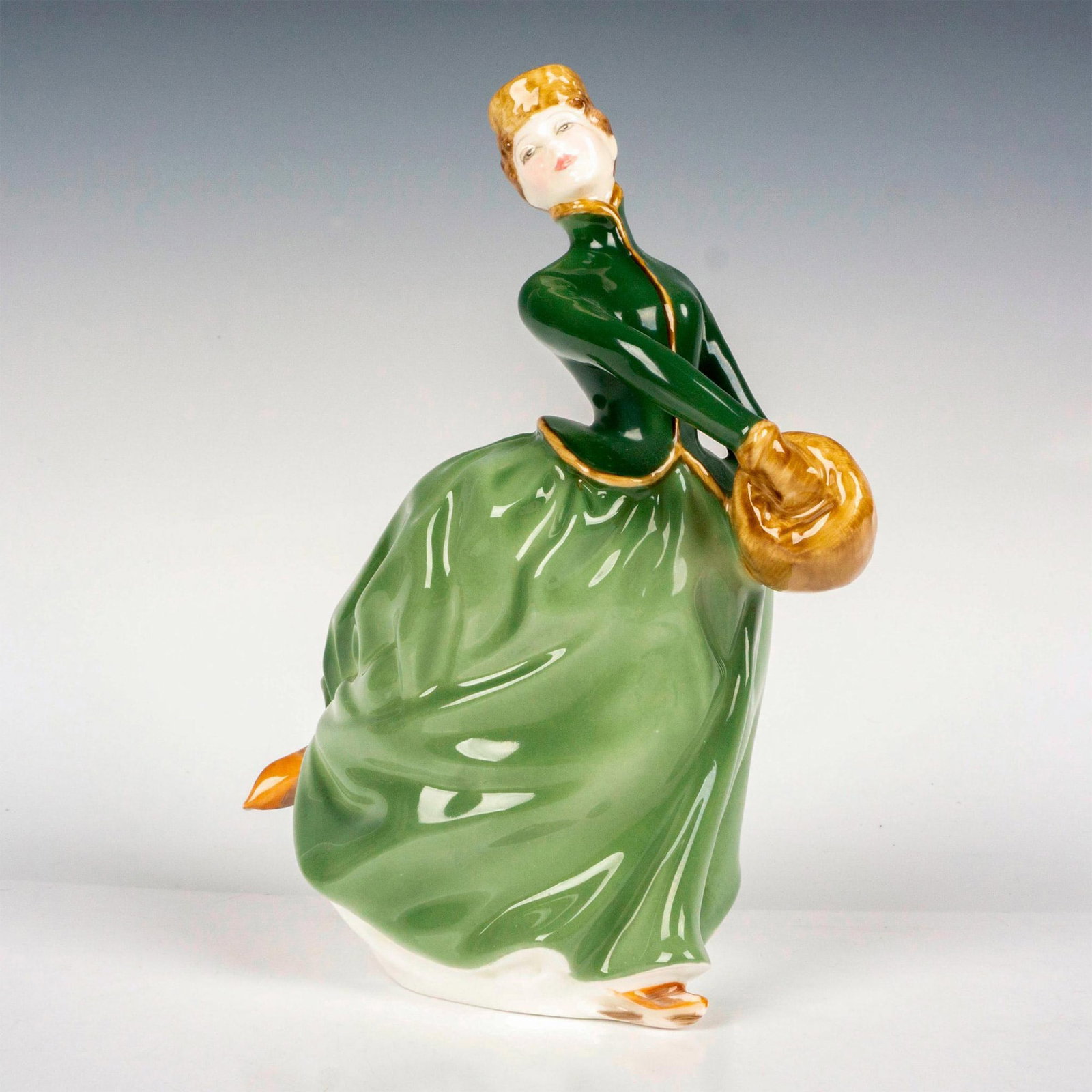Grace HN2318 - Royal Doulton Figurine: Part of the Classic Pretty Ladies collection. Royal Doulton backstamp. Artist: Mary Nicoll Issued: 1966 - 1981 Dimensions: 7.75"H Manufacturer: Royal Doulton Country of Origin: England