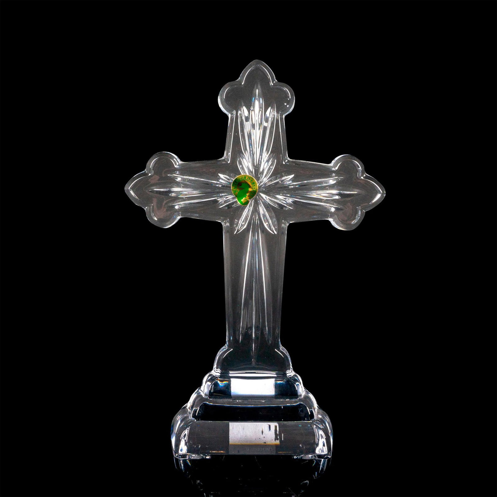 Waterford Crystal Star Standing Cross: Clear cut crystal decorated with linear pattern. Waterford etched backstamp. Dimensions: 7"L x 2.75"W x 10"H Manufacturer: Waterford Country of Origin: Ireland