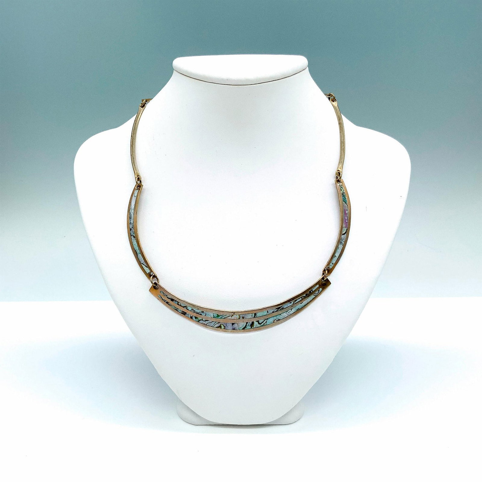 Retro Alpaca Mexican Sterling Silver and Enamel Necklace: Sterling silver sections filled with colorful enamel design patterns. Hook clasp closure. Dimensions: 17.75"L Country of Origin: Mexico