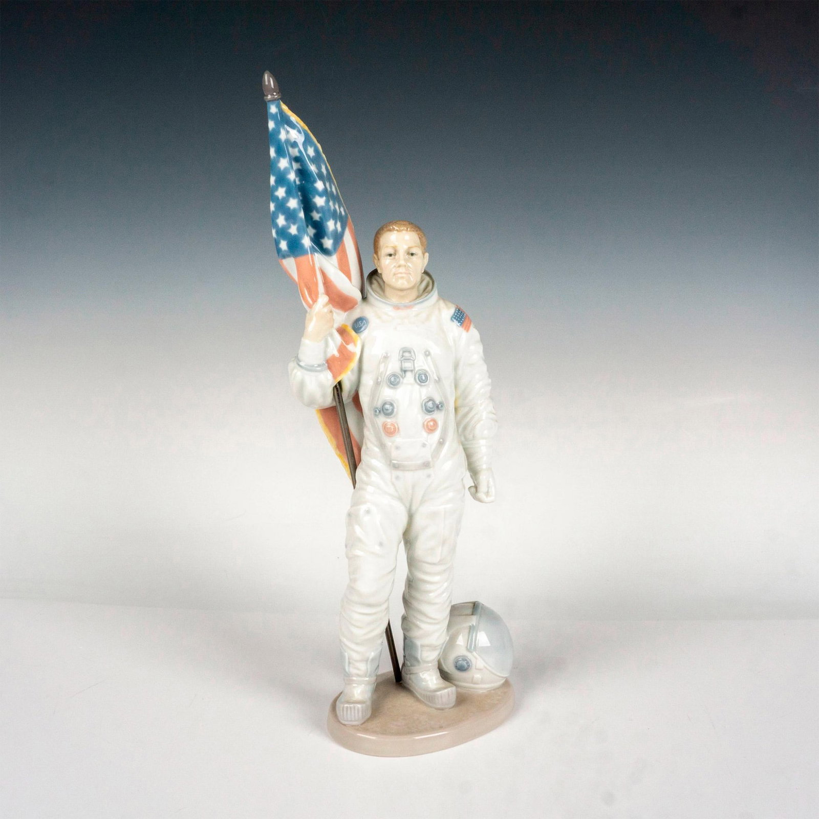 Apollo Landing 1006168 Ltd. - Lladro Porcelain Figurine: Glossy finish; Lladro backstamp. Artist: Salvador Furio Issued: 1994 - 1995 Dimensions: 16.5"H x 8.25"W Manufacturer: Lladro Country of Origin: Spain
