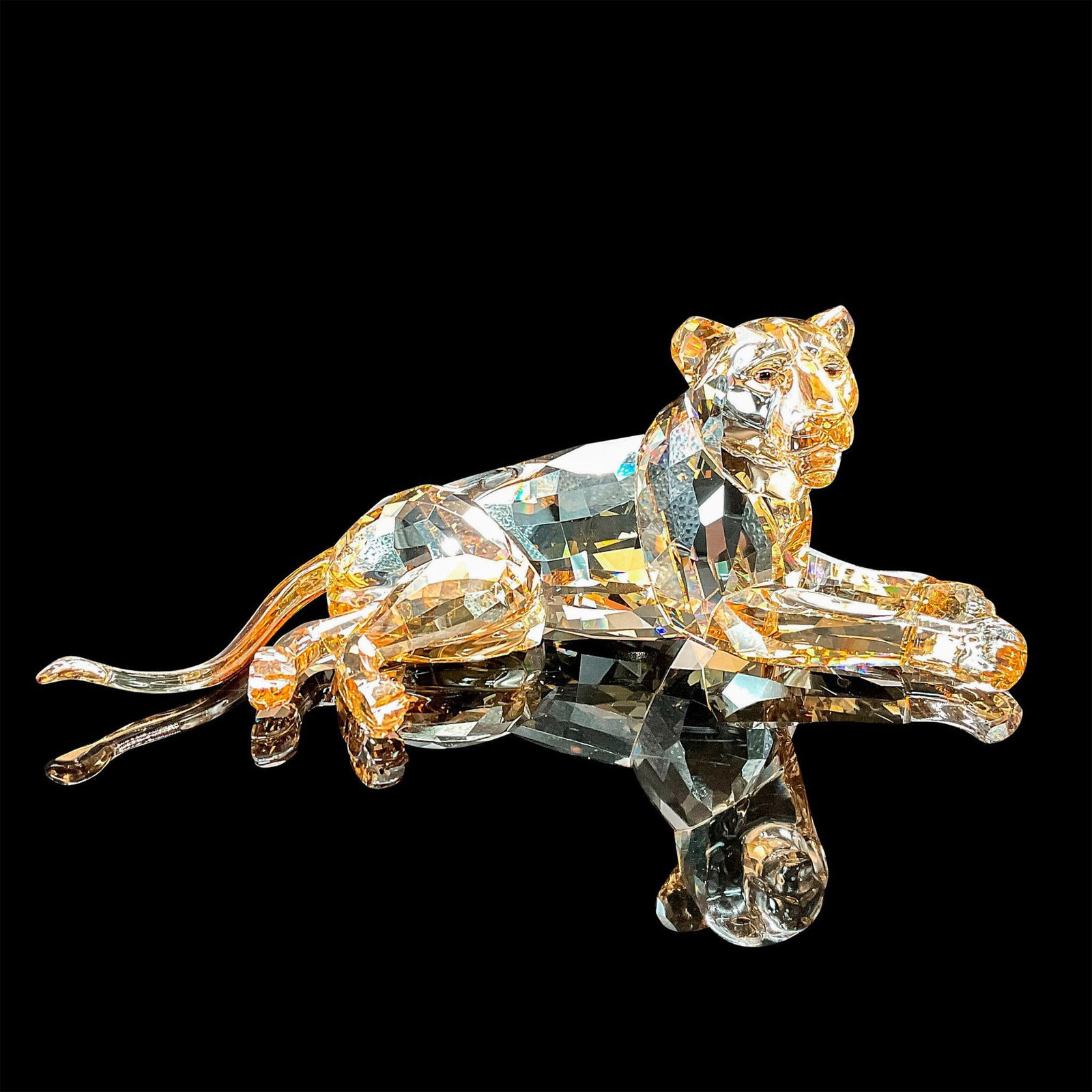 Swarovski SCS Crystal Figurine Lion Mother: Inspired by African wildlife and nature, the SCS Lion Mother is the perfect representation of Swarovski€â„¢s craftsmanship and heritage. This stunning piece sparkles brilliantly in light brow