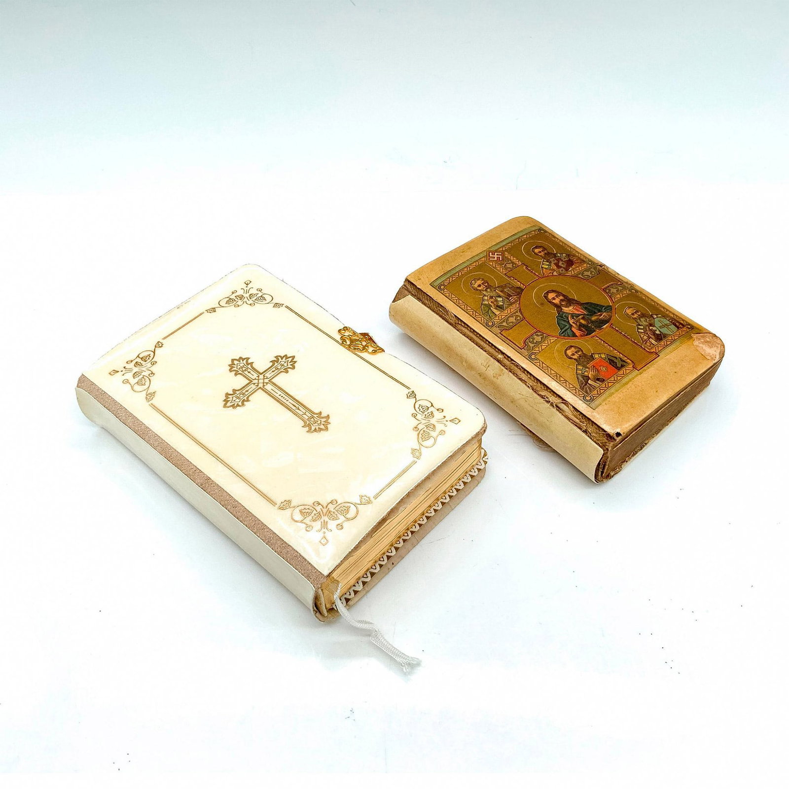 2pc Catholic Missal Books: Book 1 - edited by Reverend J. M. Lelen: Bride's Manual, Catholic Devotions with Mass for the Marriage Ceremony and The Nuptial Blessing; published 1962. The book is in fair condition. The outer bindi