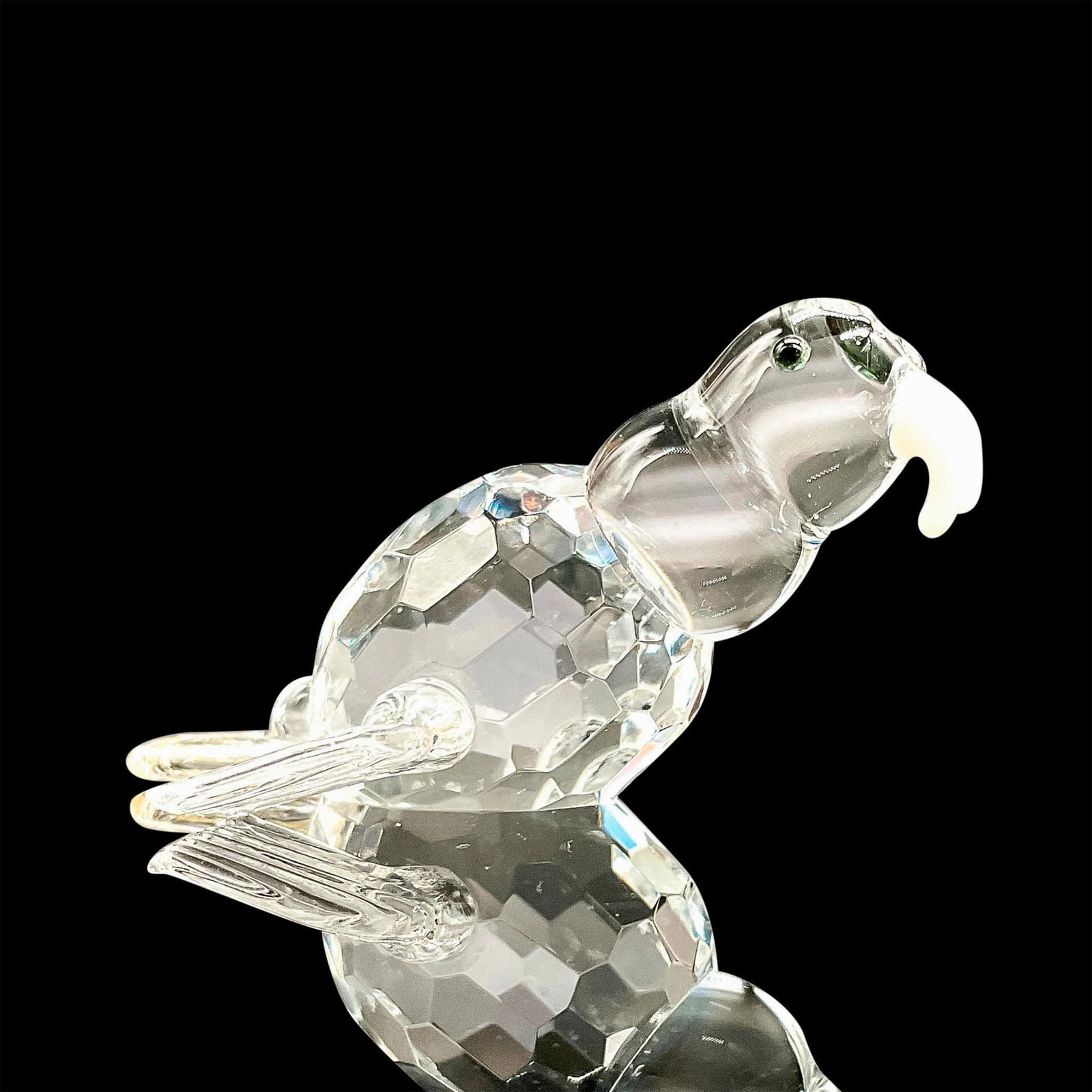 Avon Crystal Miniature Figurine, Walrus: Adorable faceted miniature crystal figurine modeled as a walrus with white teeth and black eyes. Unmarked. Dimensions: 2"L x 1.5"W x 1"H Manufacturer: Swarovski Country of Origin: Austria
