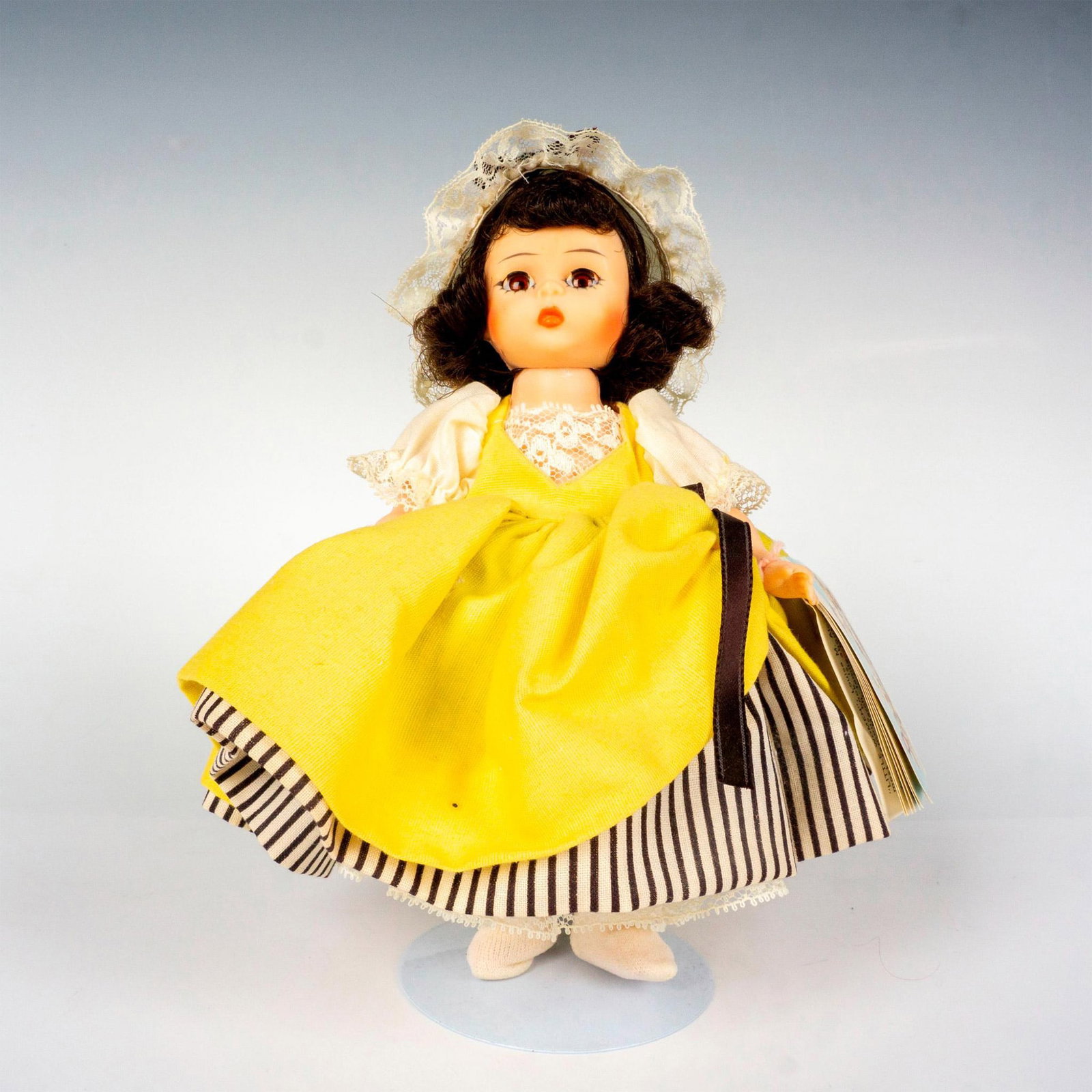 Vintage Madame Alexander Doll, French: Jointed with moveable arms, legs, and eyelids. She is dressed in a darling outfit with perfect little details. Madame Alexander hang tag and factory label. This item has its original box. Box measures