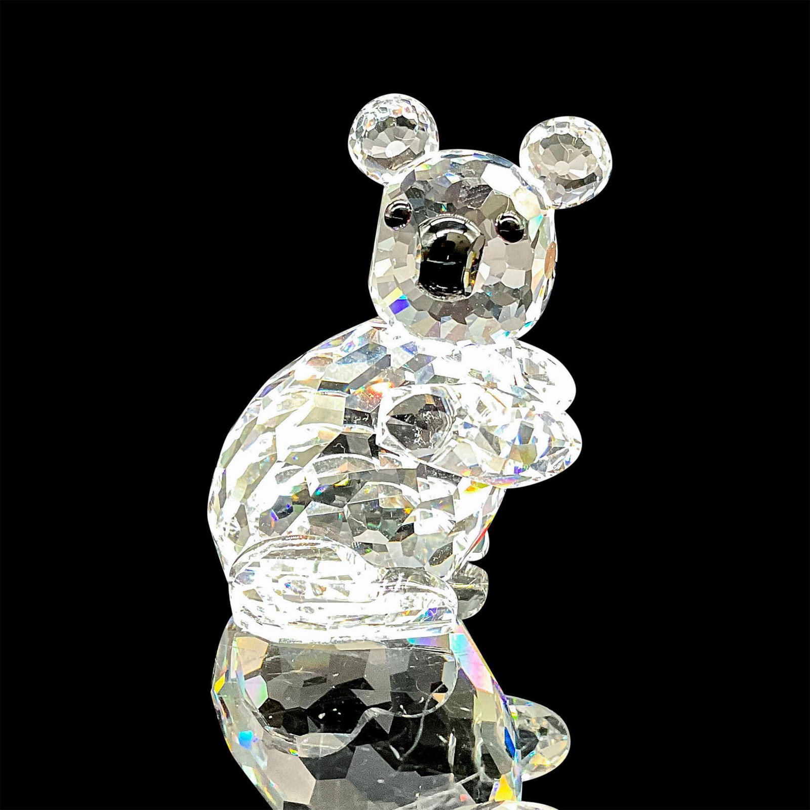 Swarovski Silver Crystal Figurine, Koala: Lead crystal part of the Endangered Species series, made with jet crystal facial features and fully faceted crystal. Swarovski etched backstamp. This item has its original box. Box measures: 3.25"