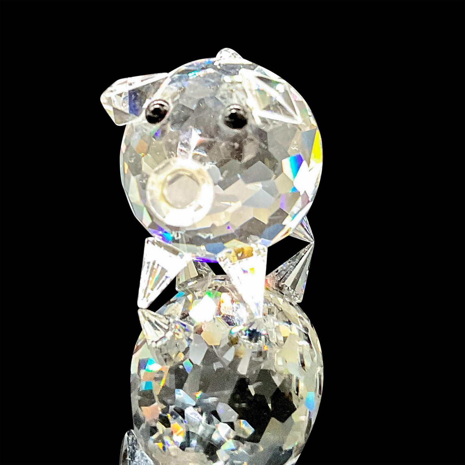 Swarovski Silver Crystal Figurine, Mini Pig: Lead crystal part of the Barnyard Friends series, made with jet crystal eyes. Swarovski etched backstamp. This item has its original box. Box measures: 2.5"W x 2.75"H. Artist: Max Schreck 