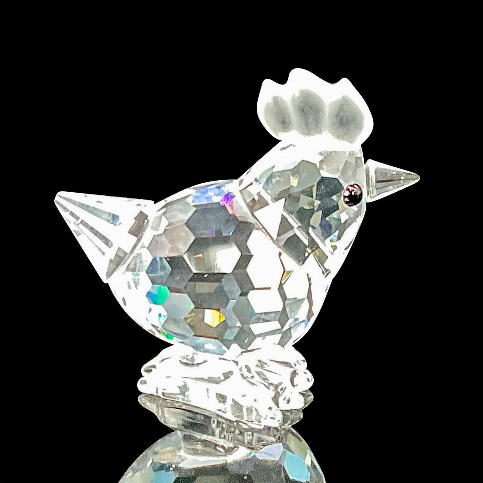 Swarovski Silver Crystal Figurine, Mini Hen: Lead crystal part of the Barnyard Friends series, made with frosted crystal comb with jet crystal eyes. Swarovski etched backstamp. This item has its original box. Box measures: 2.5"W x 2.75"