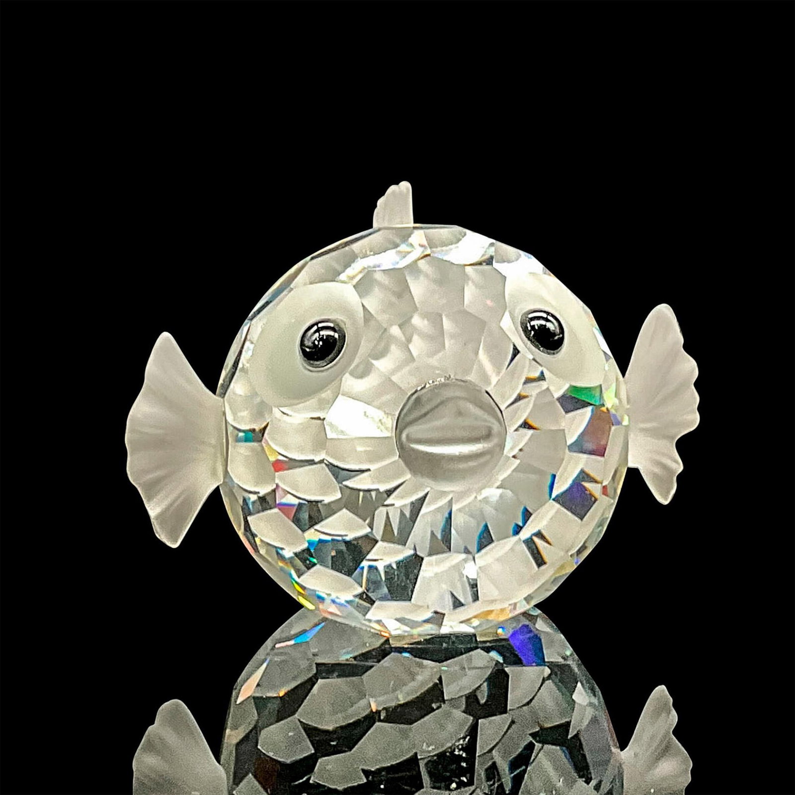 Swarovski Silver Crystal Figurine, Blowfish: Clear with opaque crystal fish fin details. Swarovski backstamp. This item has its original box. Box measures: 4"H x 5"dia. Dimensions: 2.5"L x 2.5"W x 1.75"H Manufacturer: Swarovski Country of Origin