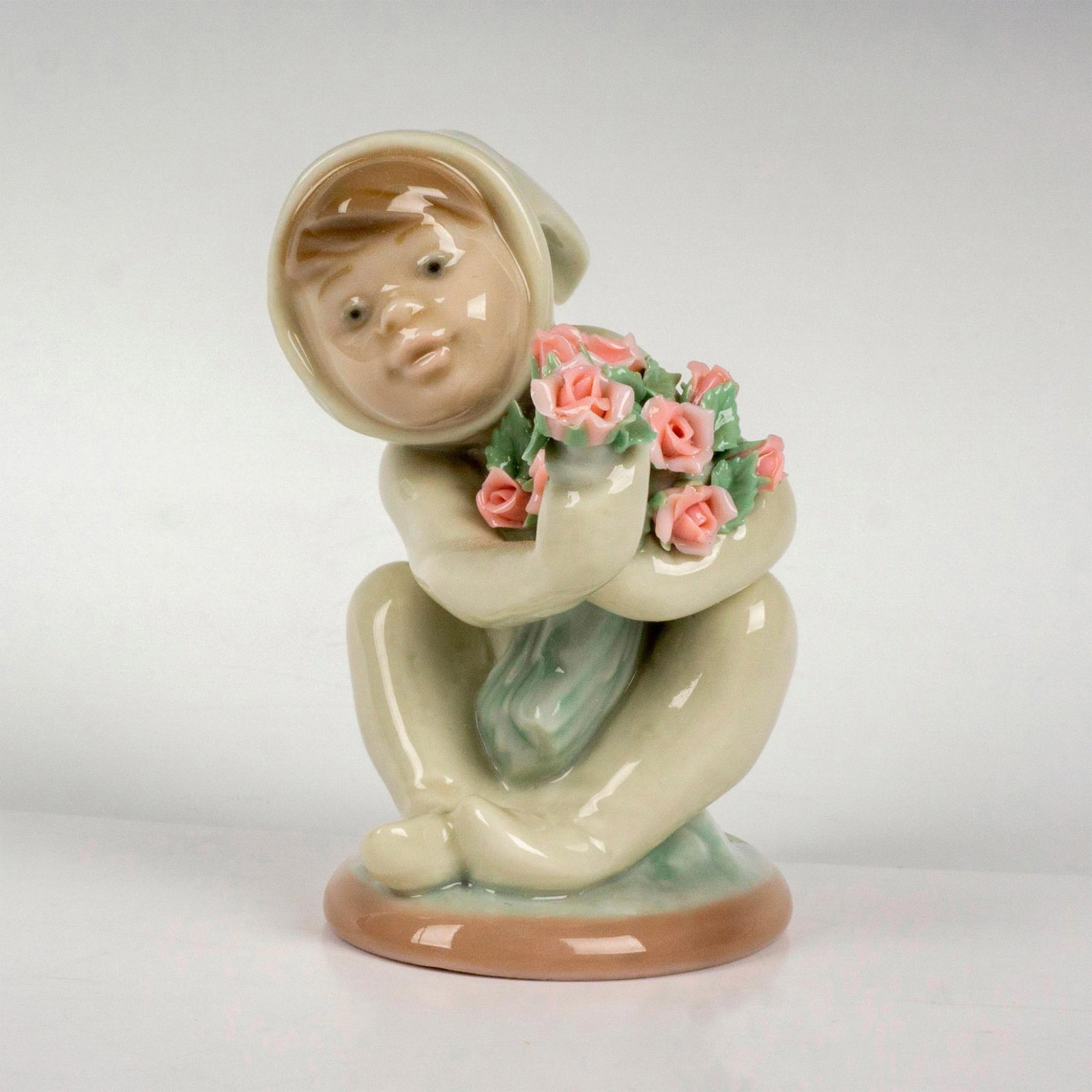 A New Friend 1001506 - Lladro Porcelain Figurine: Glossy finish; Lladro backstamp. Artist: Juan Huerta Issued: 1986 - 1991 Dimensions: 3.25"H Manufacturer: Lladro Country of Origin: Spain Condition Age related wear.