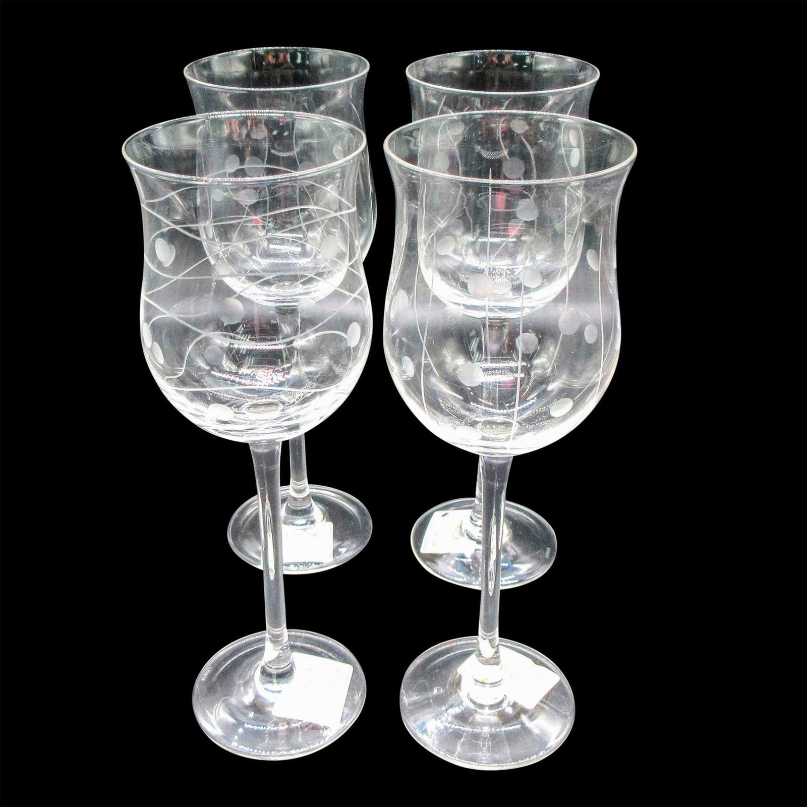 4pc Lenox Wine Glasses, Assorted Graphics: Four tulip shaped wine glasses with assorted frosted line and circle details. Lenox tags. Original box included. Box dimensions: 10.5"H x 7"W x 7"L. #Lenox Dimensions: 9" H Manufacturer: Lenox Conditi