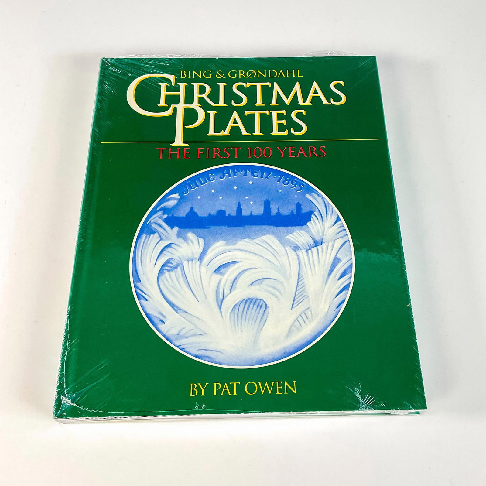 Hardcover Book, Bing & Grondahl Christmas Plates: 'The First 100 Years.' Perfect resource for the Bing and Grondahl collector and those interested in learning more about their Christmas plates series. Sealed. Depth: 0.75 in. Contains 255 pages. Artis