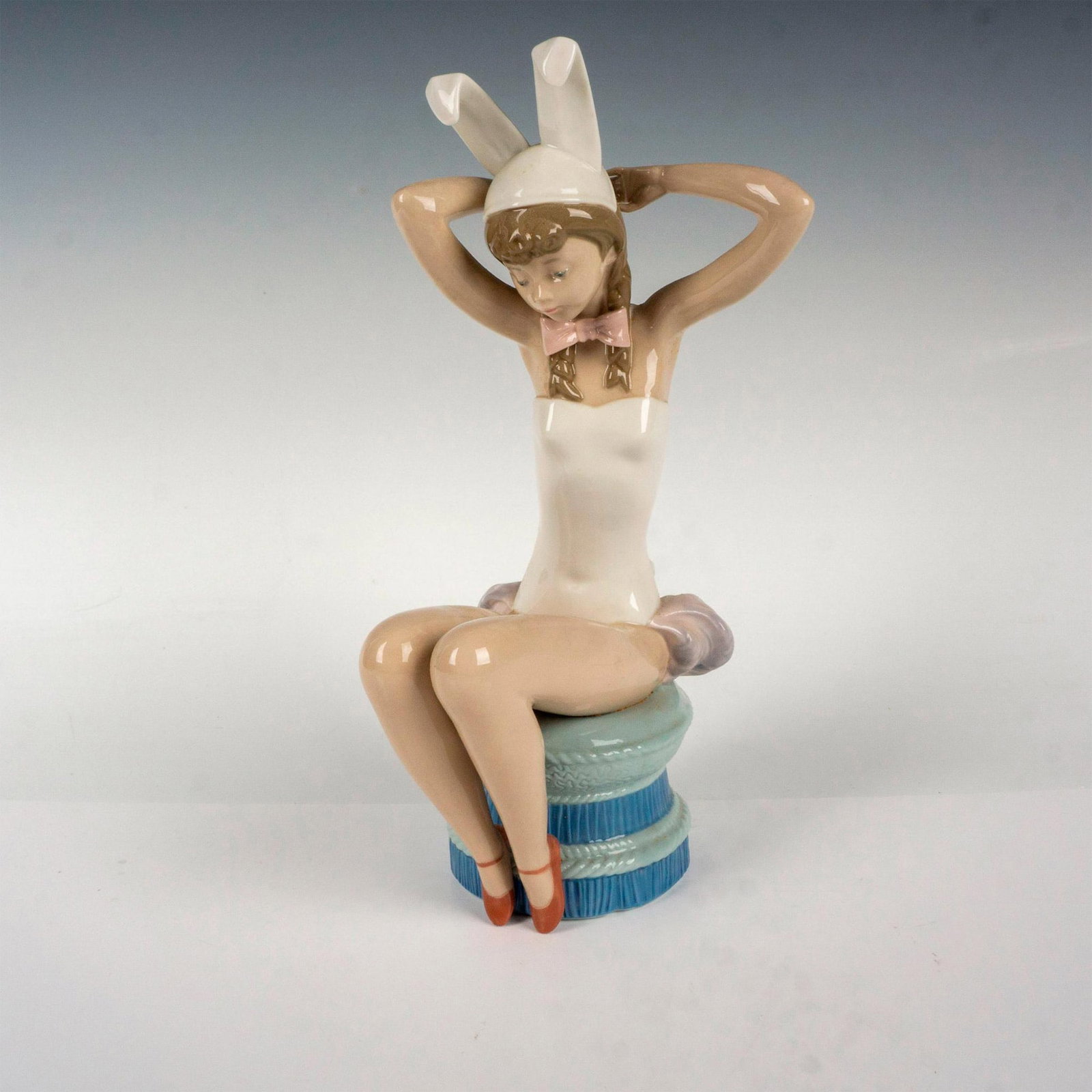Bunny 1005163 - Lladro Porcelain Figurine: Glossy finish; Lladro backstamp. Artist: Salvador Debon Issued: 1982 - 1985 Dimensions: 10.25"H Manufacturer: Lladro Country of Origin: Spain