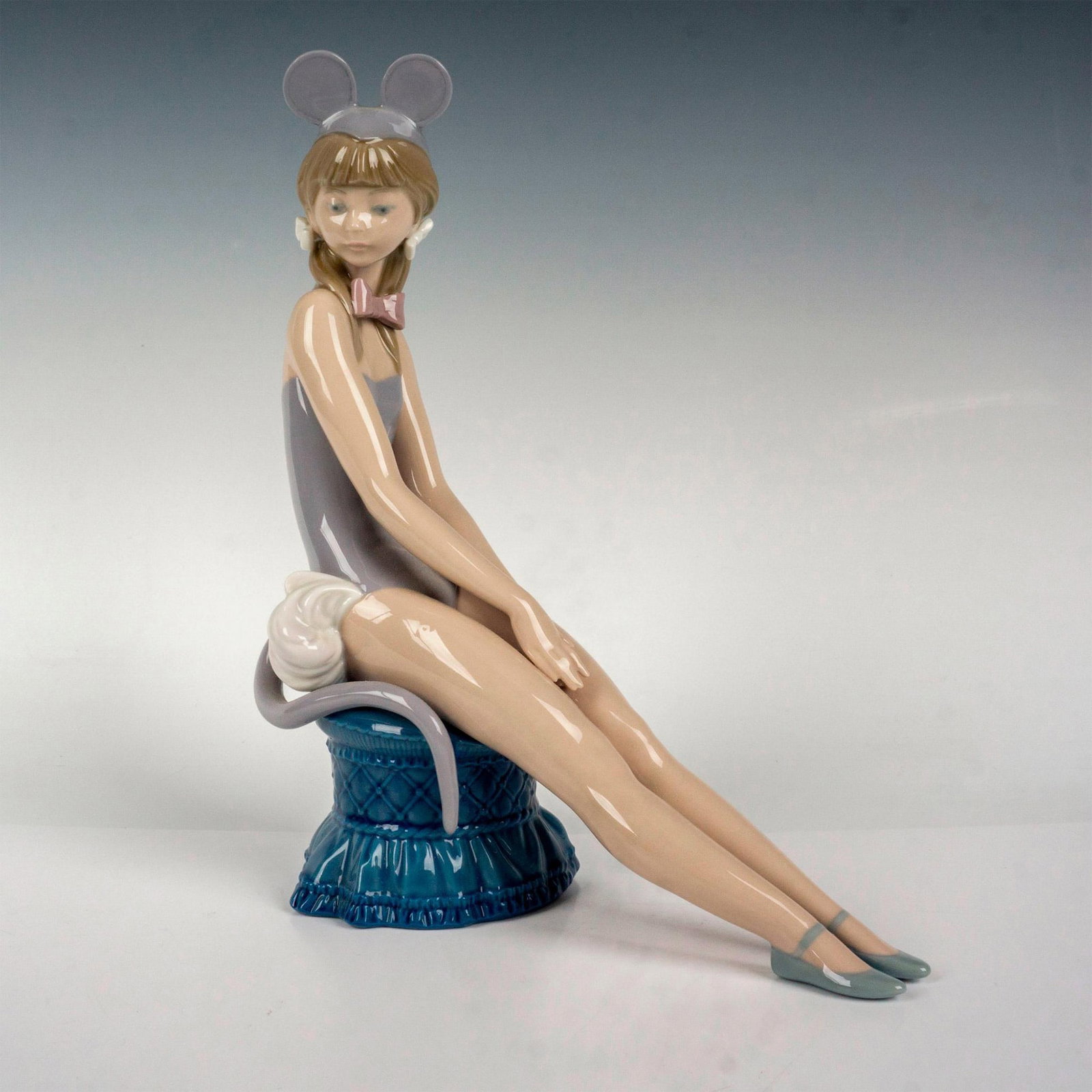 Mindy 1005162 - Lladro Porcelain Figurine: Glossy finish; Lladro backstamp. Artist: Salvador Debon Issued: 1982 - 1985 Dimensions: 9.5"H Manufacturer: Lladro Country of Origin: Spain