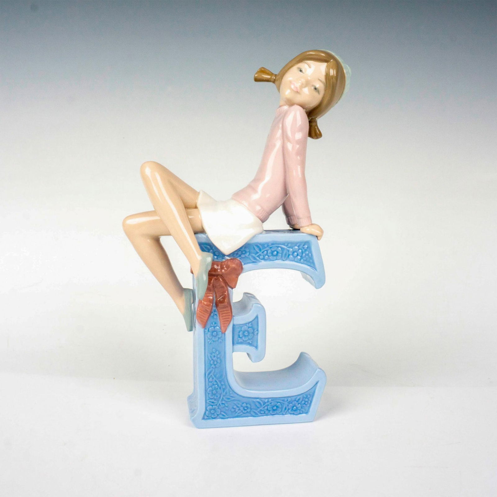 Schoolgirl E 1005146 - Lladro Porcelain Figurine (1 of 4)
