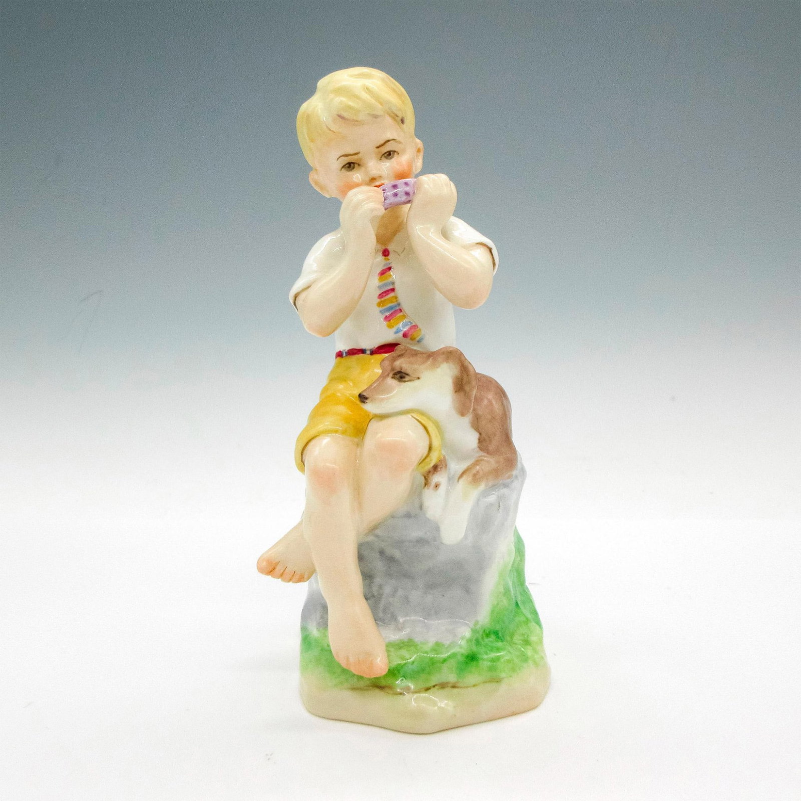 Royal Worcester Bone China Figurine, June: Adorable glazed figural of little boy and his dog. Royal Worcester backstamp. 3456. Artist: F.G. Doughty Issued: 20th century Dimensions: 3"L x 3"W x 6.5"H Manufacturer: Royal Worcester Country of Or