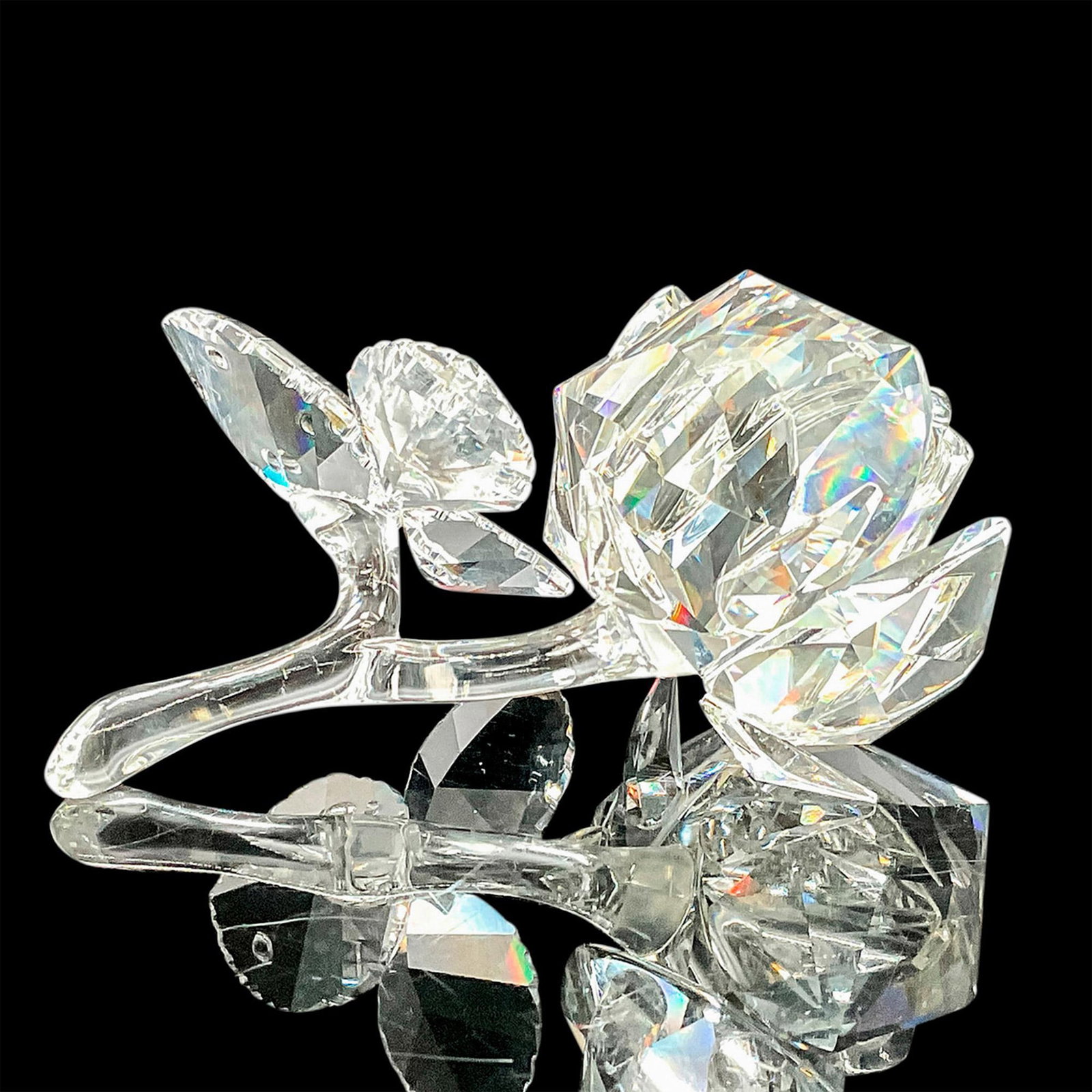 Swarovski Crystal Figurine, Rose: This Swarovski crystal Rose was part of the Exquisite Accents collection and was later moved to the In the Secret Garden theme and is made from clear crystal. Swarovski etched backstamp. Artist: Micha