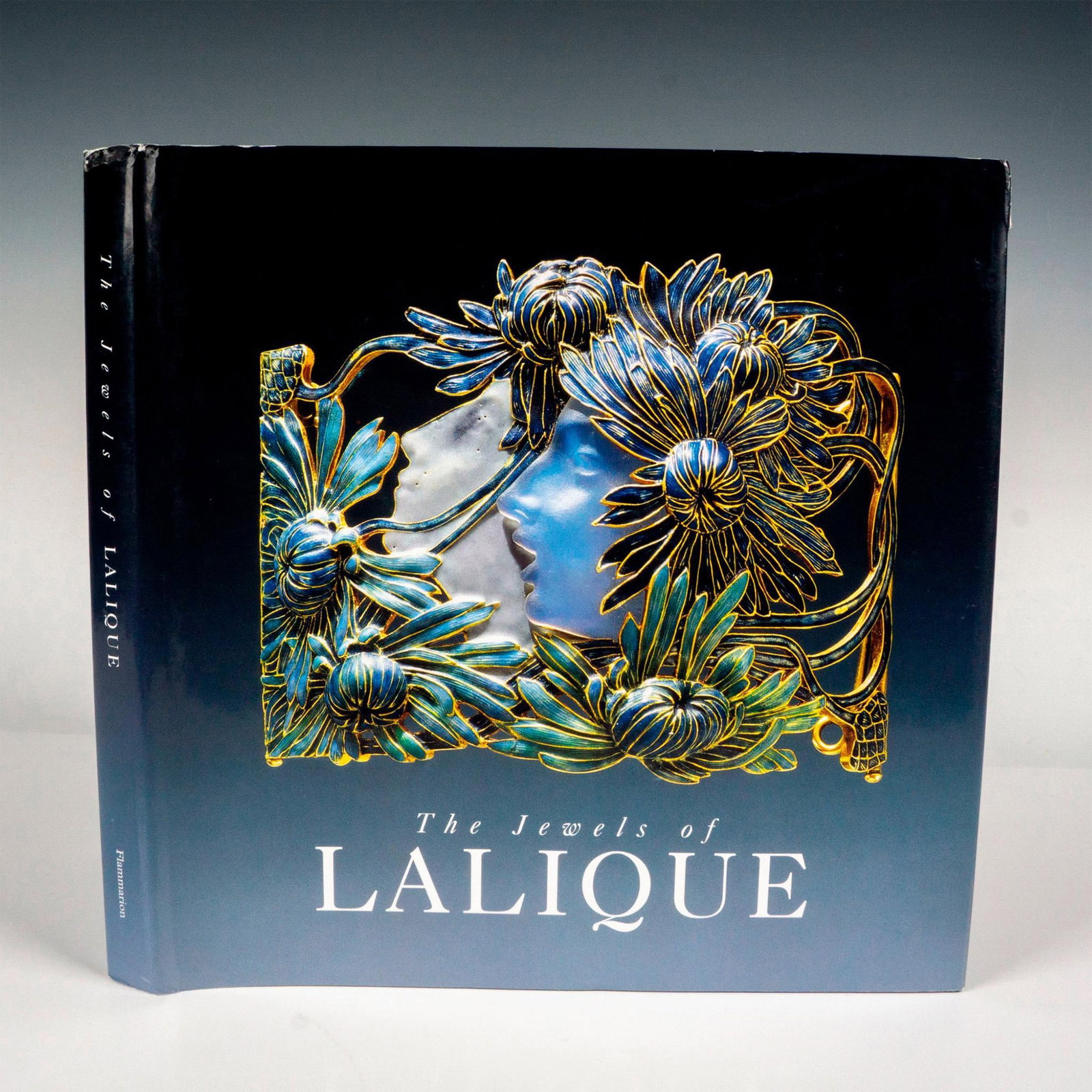 1st Ed. The Jewel of Lalique, Edited by Yvonne Brunhammer: Paris: Flammarion, 1998. A hardcover exhibition catalogue book, featuring a Narcisse dog collar plaque on the cover. 224-pages and over a hundred colored illustrations of Rene Lalique's (1860-1945) go