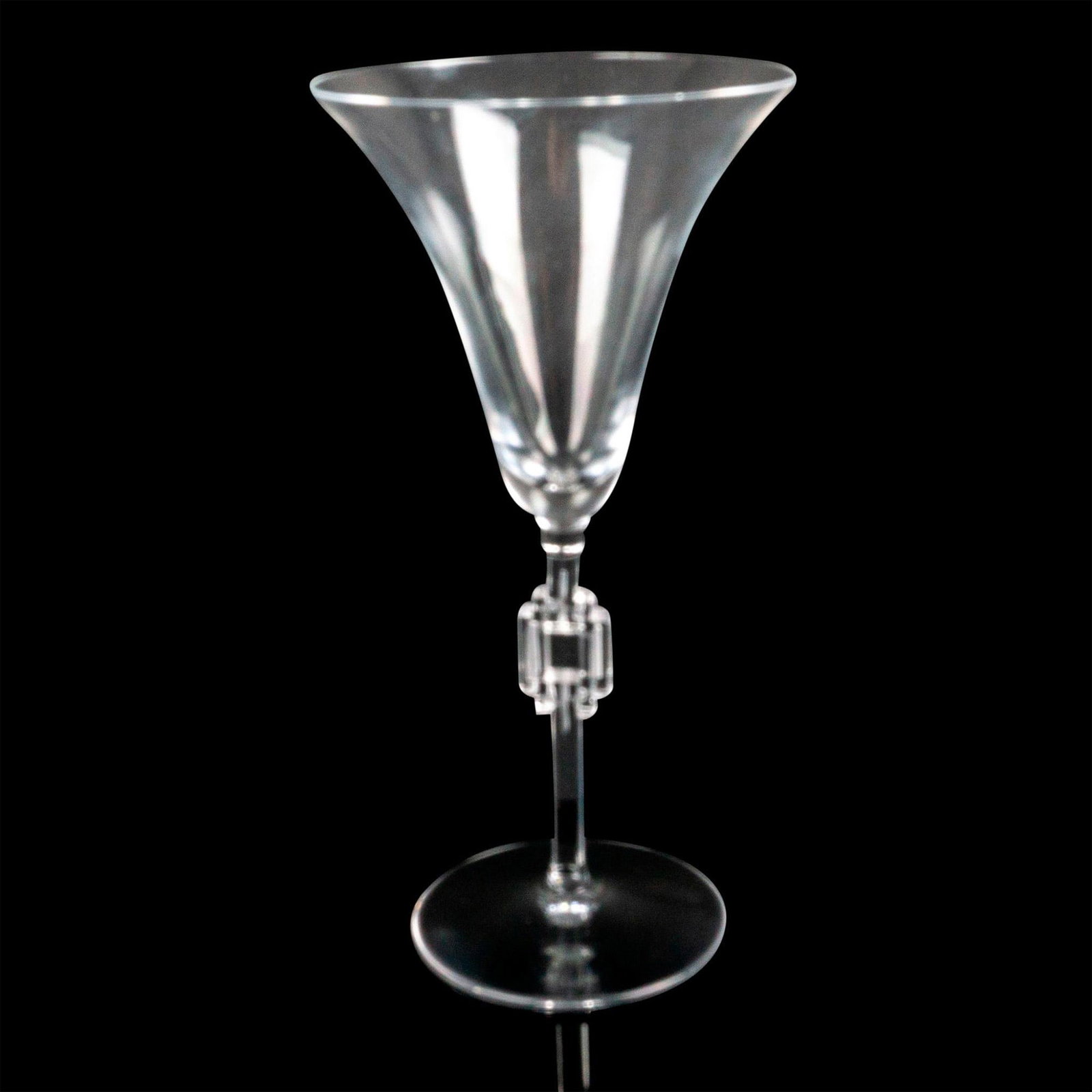 Lalique Crystal Wine Glass, Tosca: Beautiful, faceted stem with no trim with a fluted bowl. Lalique, France backstamp. Issued: 1988-2007 Dimensions: 7"H x 3.5"dia. Country of Origin: France Manufacturer: Lalique