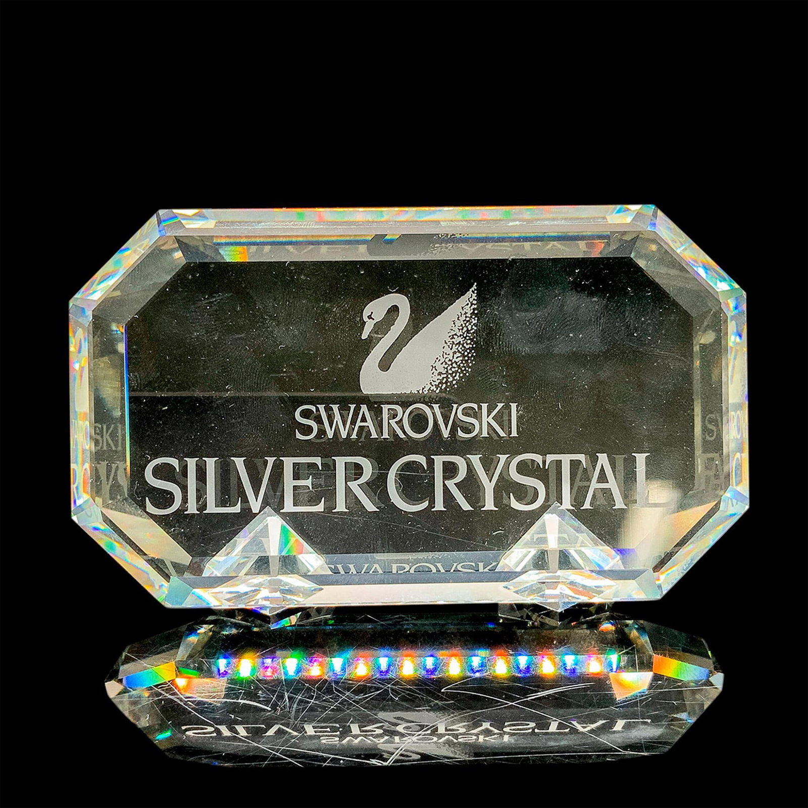 Swarovski Silver Crystal Dealer Plaque: Rare crystal plaque for Swarovski dealers featuring the swan logo. Dimensions: 4.25"L x 1.5"W x 2.5"H Manufacturer: Swarovski Country of Origin: Austria