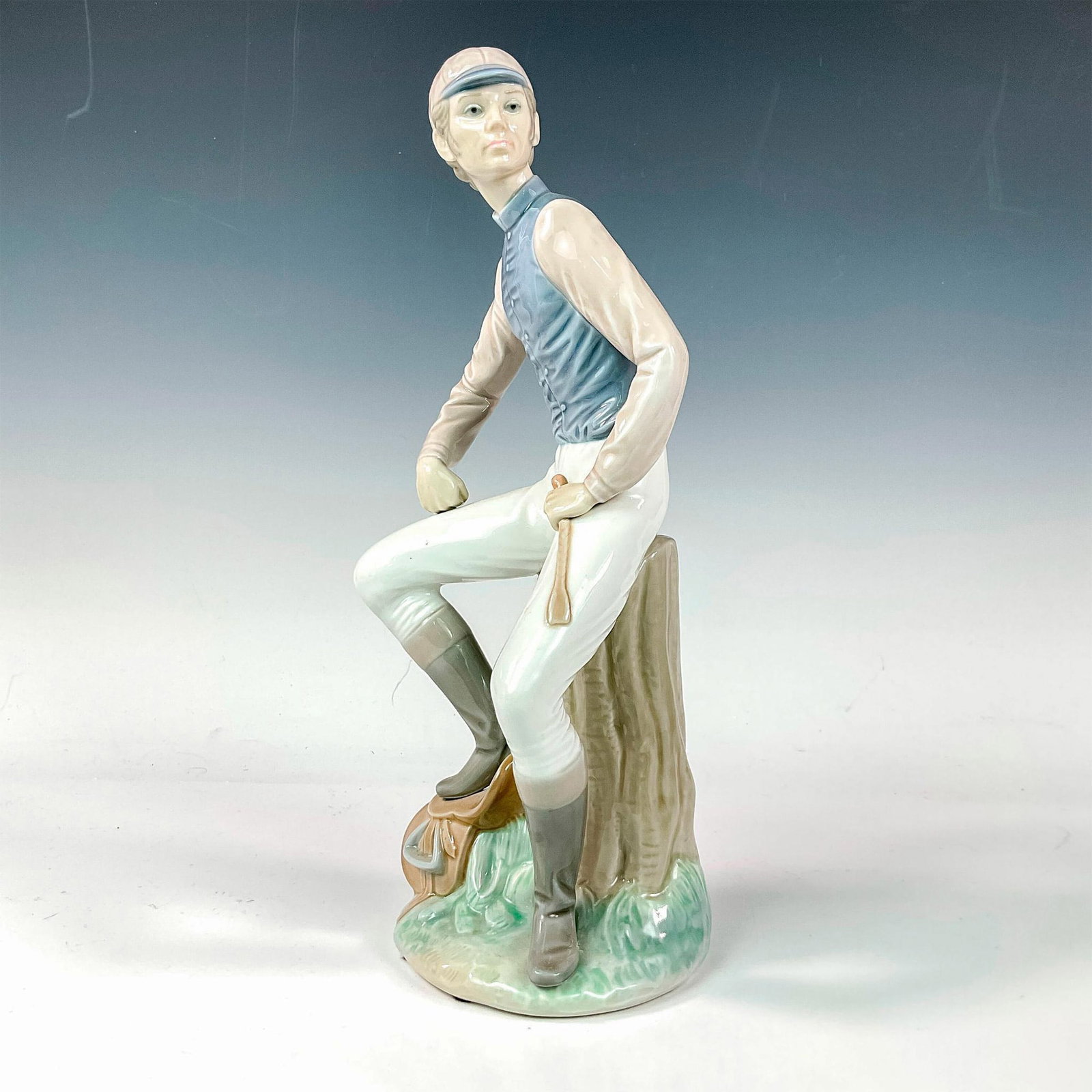 Male Jockey 1001341 - Lladro Porcelain Figurine: Glossy finish; Lladro backstamp. Artist: Francisco Catala Issued: 1977 - 1981 Dimensions: 12.25"H Manufacturer: Lladro Country of Origin: Spain