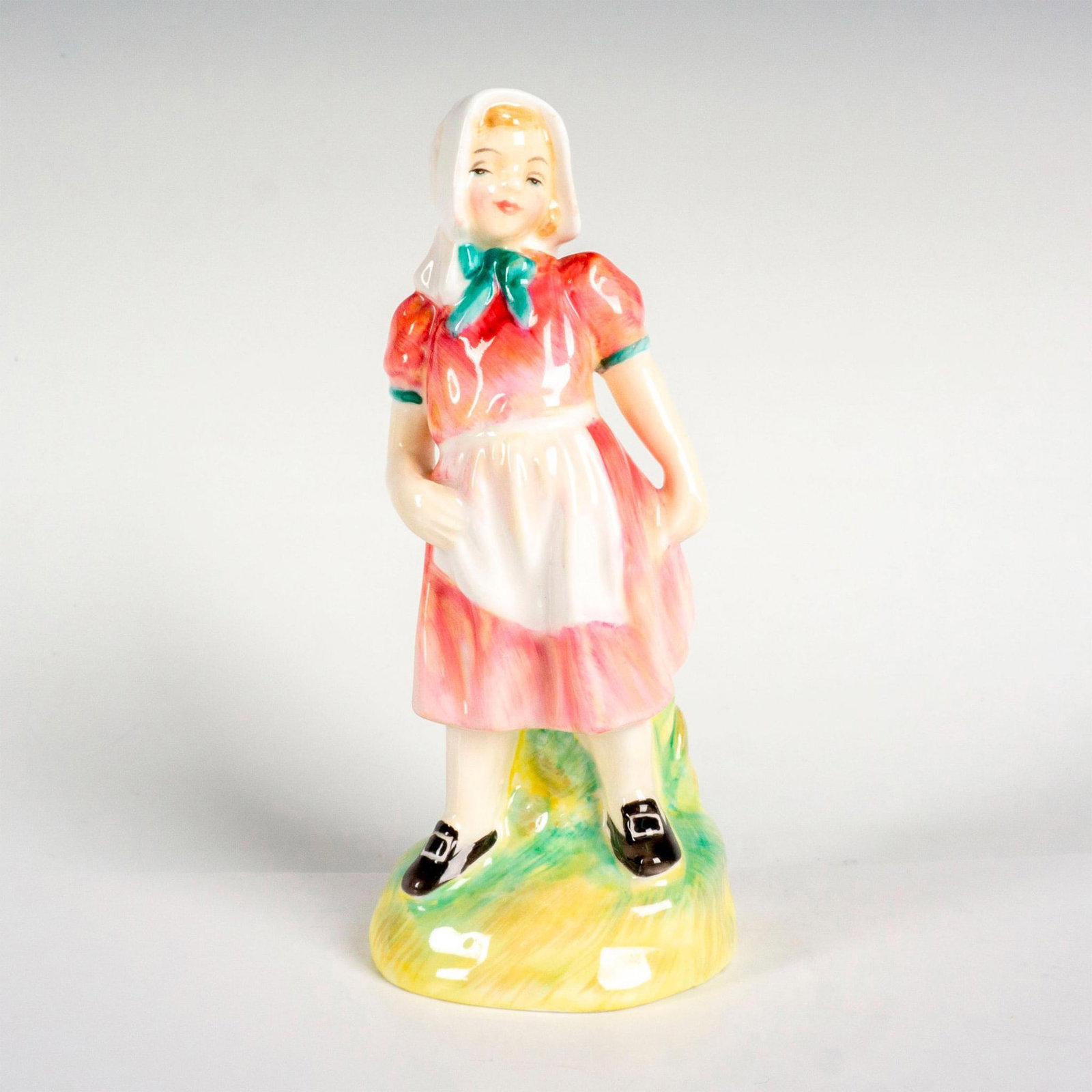 Jill - HN2061 - Royal Doulton Figurine: Nursery Rhyme series; young girl in red dress. Royal Doulton backstamp. Artist: Leslie Harradine Issued: 1950 - 1971 Dimensions: 5.5"H Manufacturer: Royal Doulton Country of Origin: England
