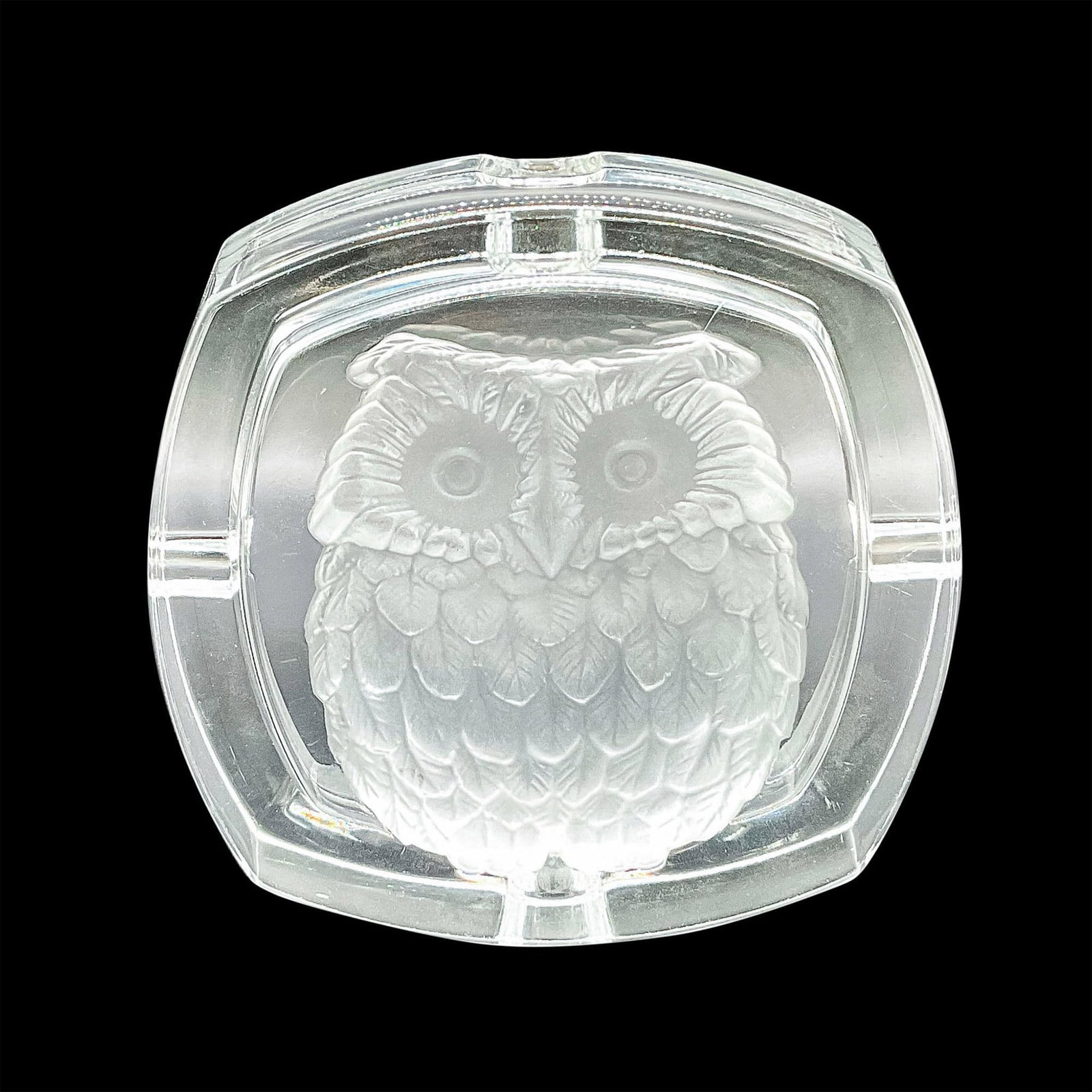 Vintage Cristal D'arques Owl Ashtray: A clear, square ashtray with a cut frosted owl on the bottom. Dimensions: 5.25"L x 5.25"W 1.5"H Manufacturer: Cristal D'arques Country of Origin: France