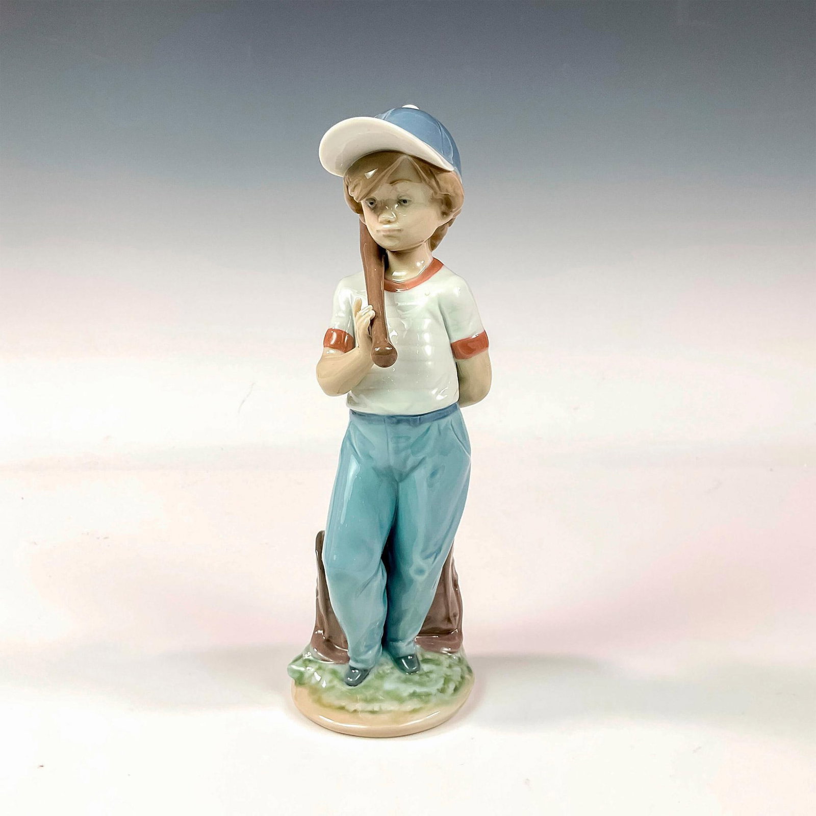 Can I Play ? 1007610 - Lladro Porcelain Figurine: Glossy finish; Lladro backstamp. Artist: Antonio Ramos Issued: 1990 - 1992 Dimensions: 8.25"H x 3.5"W Manufacturer: Lladro Country of Origin: Spain