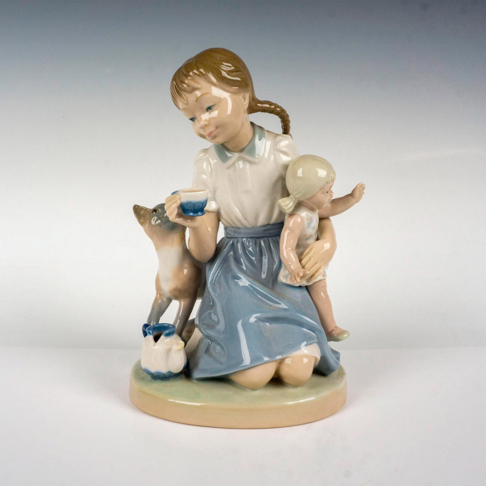 Childs Play 1001280 - Lladro Porcelain Figurine: Glossy finish; Lladro backstamp. Artist: Salvador Furio Issued: 1974 - 1983 Dimensions: 7.5"H Manufacturer: Lladro Country of Origin: Spain