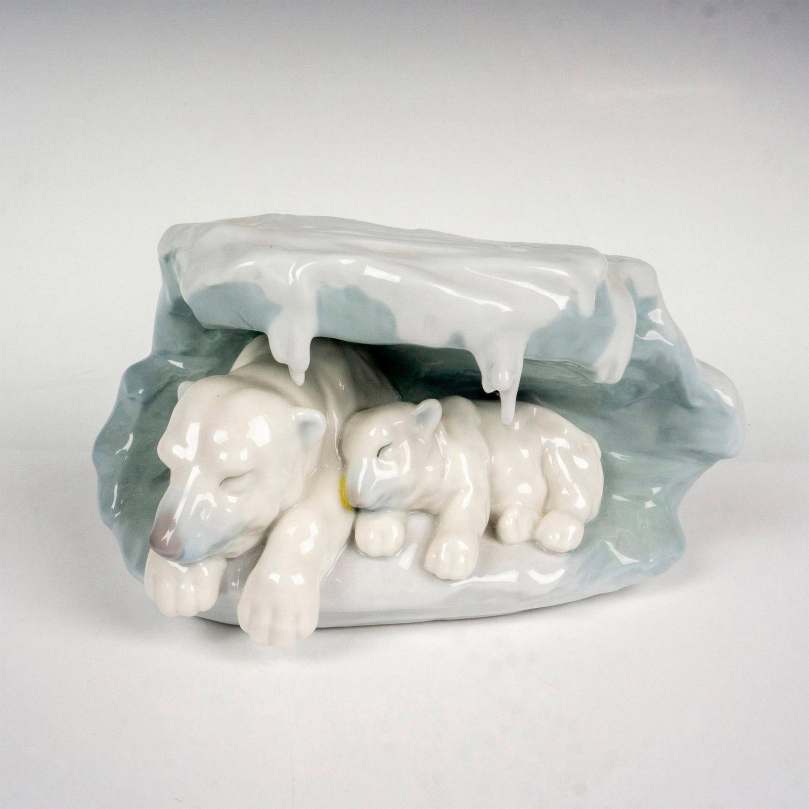 A Snowy Sanctuary 1008062 - Lladro Porcelain Figurine: Glossy finish; Lladro backstamp. Includes original box. Box measures 9"L x 10.25"W x 8"H. Artist: Antonio Ramos Issued: 2004 - 2008 Dimensions: 4.5"H x 7.5"W Manufacturer: Lladro Country of Origin:
