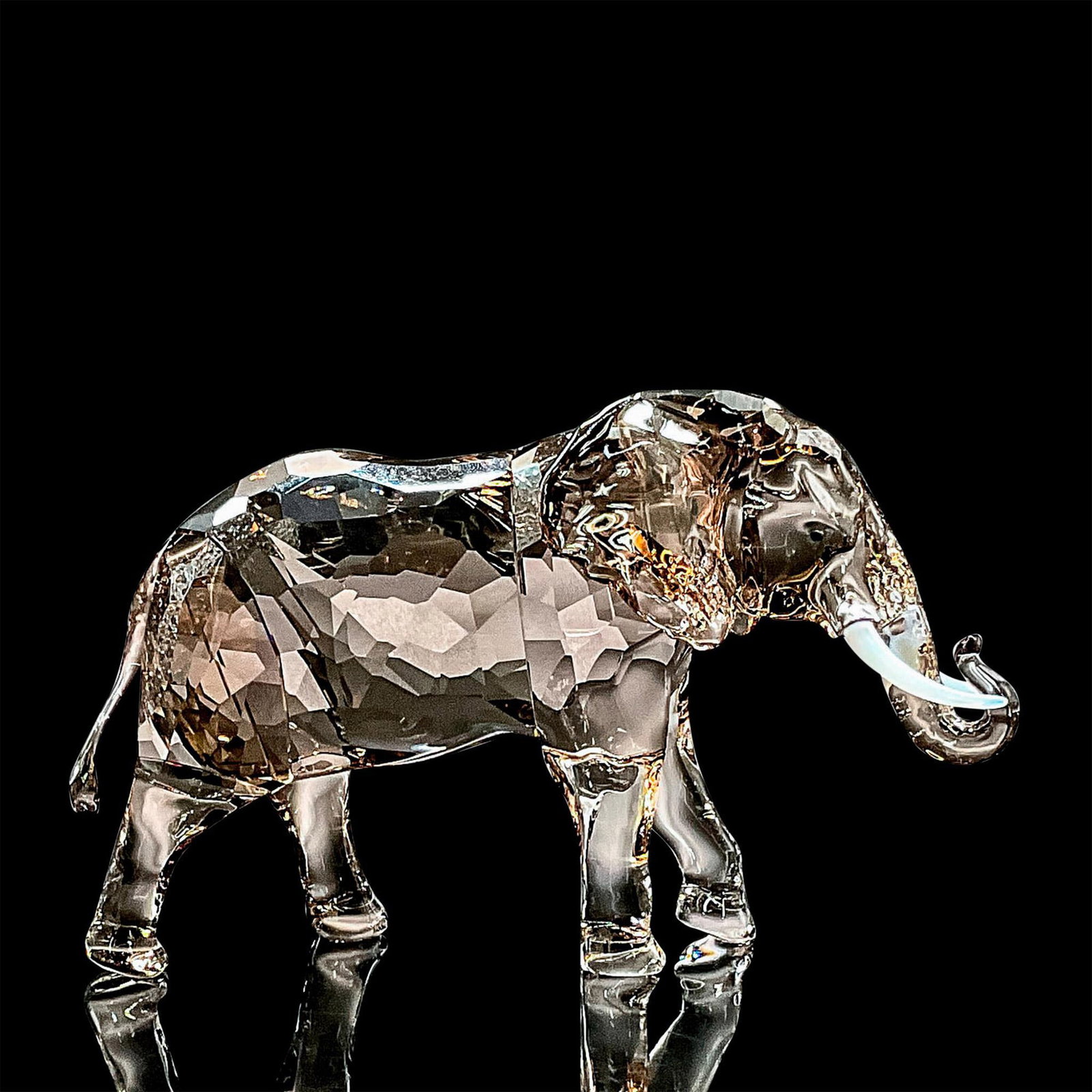 Swarovski SCS Crystal Figurine, Elephant Zena: Created exclusively for SCS members, this exceptional jubilee Edition celebrates 35 years of the Swarovski Crystal Society. The name of the piece, Zena, means friendly or hospitable encapsulating the 