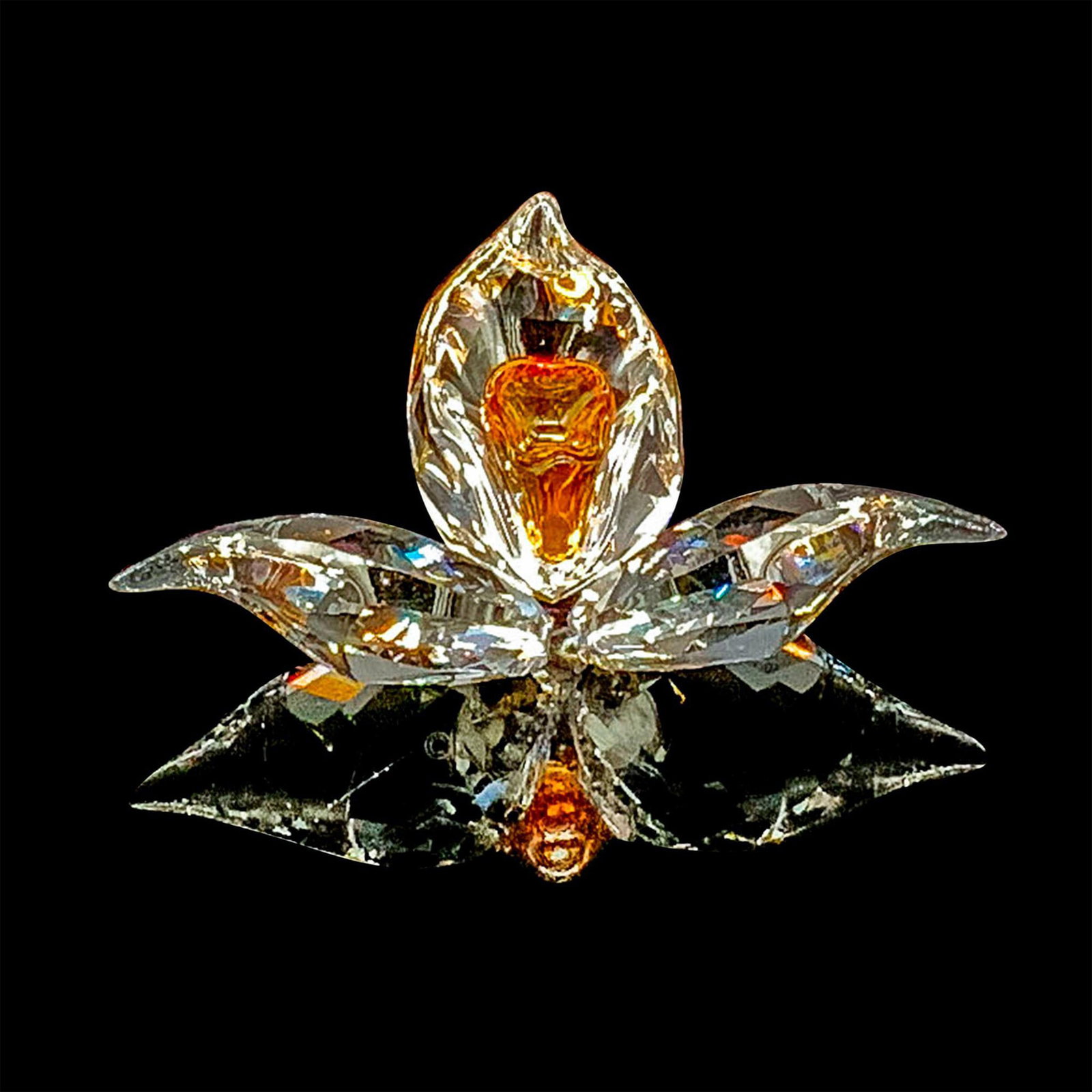 Swarovski Crystal Figurine, SCS African Orchid: This orchid was the gift given to members joining or renewing their membership of the Swarovski Crystal Society (SCS) in 2018. Item includes original box measuring 3.75"L x 3.75"W x 1.25"H. Artist: Ma