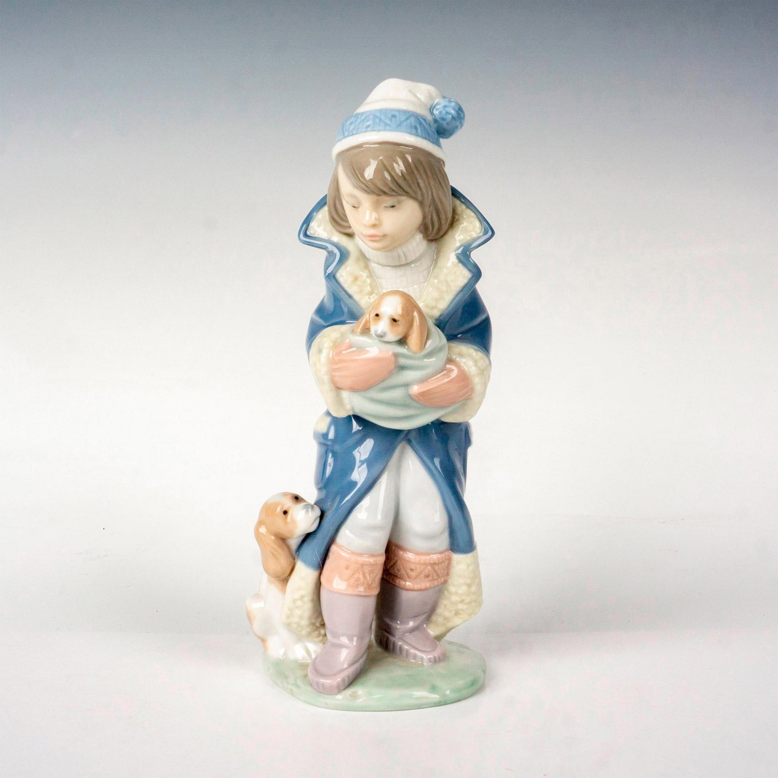 Friday's Child 1006019 - Lladro Porcelain Figurine: Glossy finish; Lladro backstamp. Artist: Juan Huerta Issued: 1995 - 1997 Dimensions: 7.5"H Manufacturer: Lladro Country of Origin: Spain