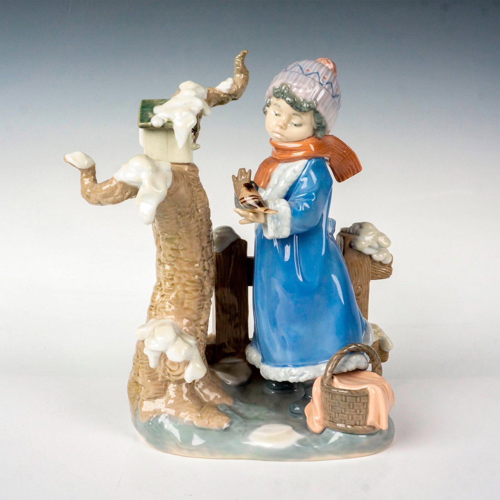Winter Frost 1005287 - Lladro Porcelain Figurine: Glossy finish; Lladro backstamp. Artist: Antonio Ramos Issued: 1985 - 2007 Dimensions: 10"H x 6.75"W Manufacturer: Lladro Country of Origin: Spain
