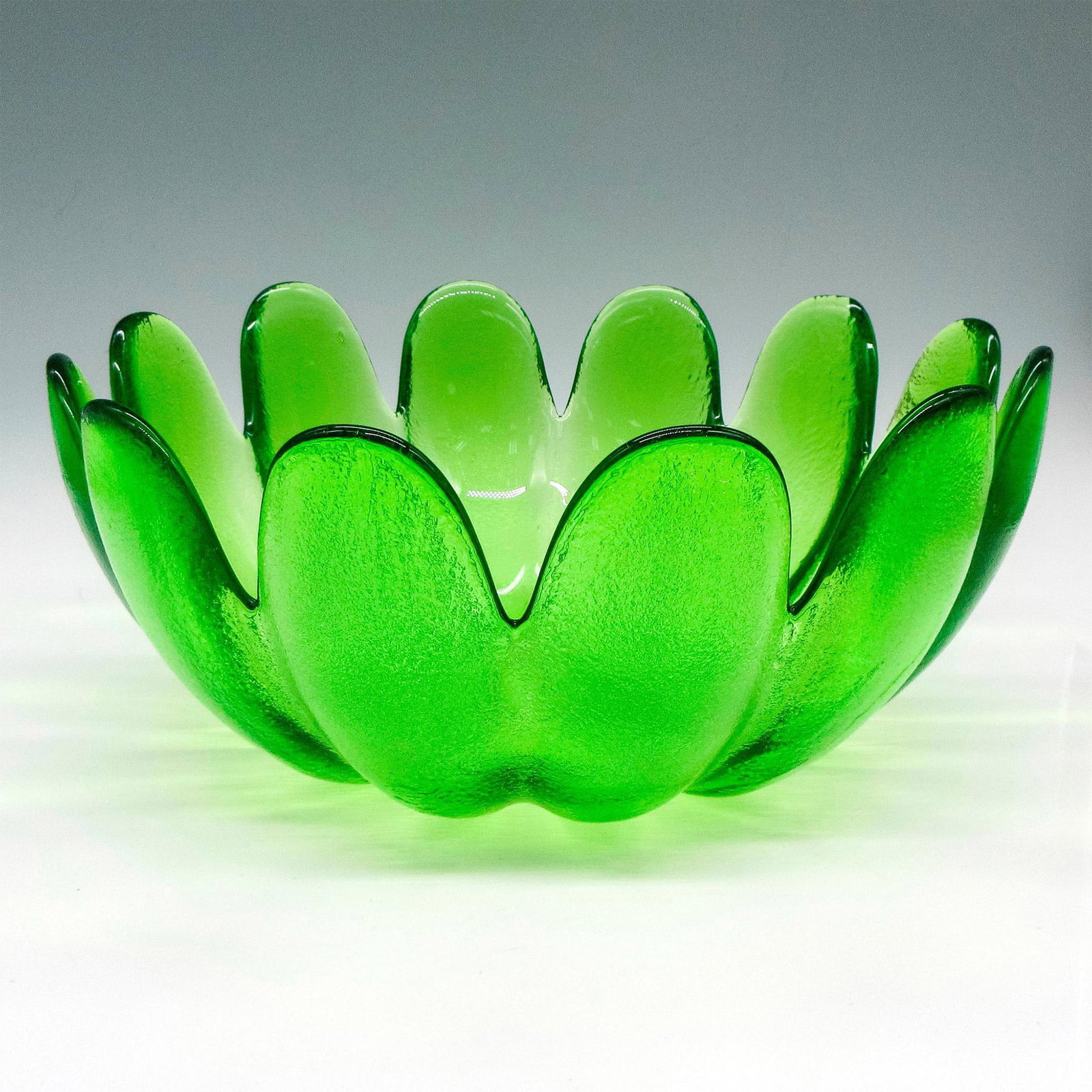 Vintage Indiana Green Glass Bowl: Rough textured granular exterior glass with smooth interior glass in petal design. Issued: 20th century Dimensions: 4.75"H x 11"dia. Manufacturer: Indiana Glass Co. Country of Origin: United States