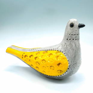 Rare Aldo Londi Bitossi Ceramic Bird Figurine: Beautiful unmarked ceramic bird with matte grey body and glossy yellow wings. Artist: Aldo Londi Dimensions: 9"L x 5"W x 6"H Country of Origin: Italy