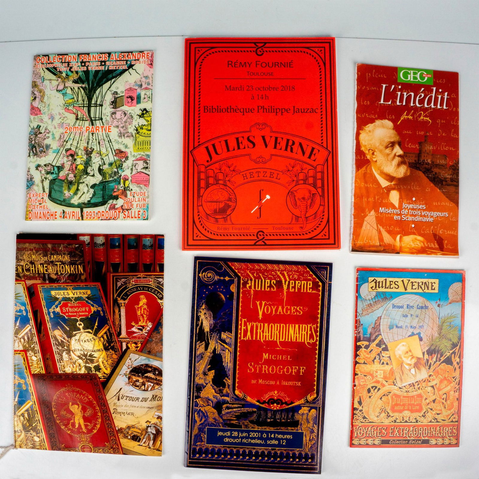 One Concorde Menu & Five Jules Verne Auction Catalogs: This lot includes one Concorde Air France menu Paris-New York for 24 October 1992 with 19th century French polychromatic cloth and paper bindings cover, the pages of L'Inedit Jules Verne: Joyeuses Mis