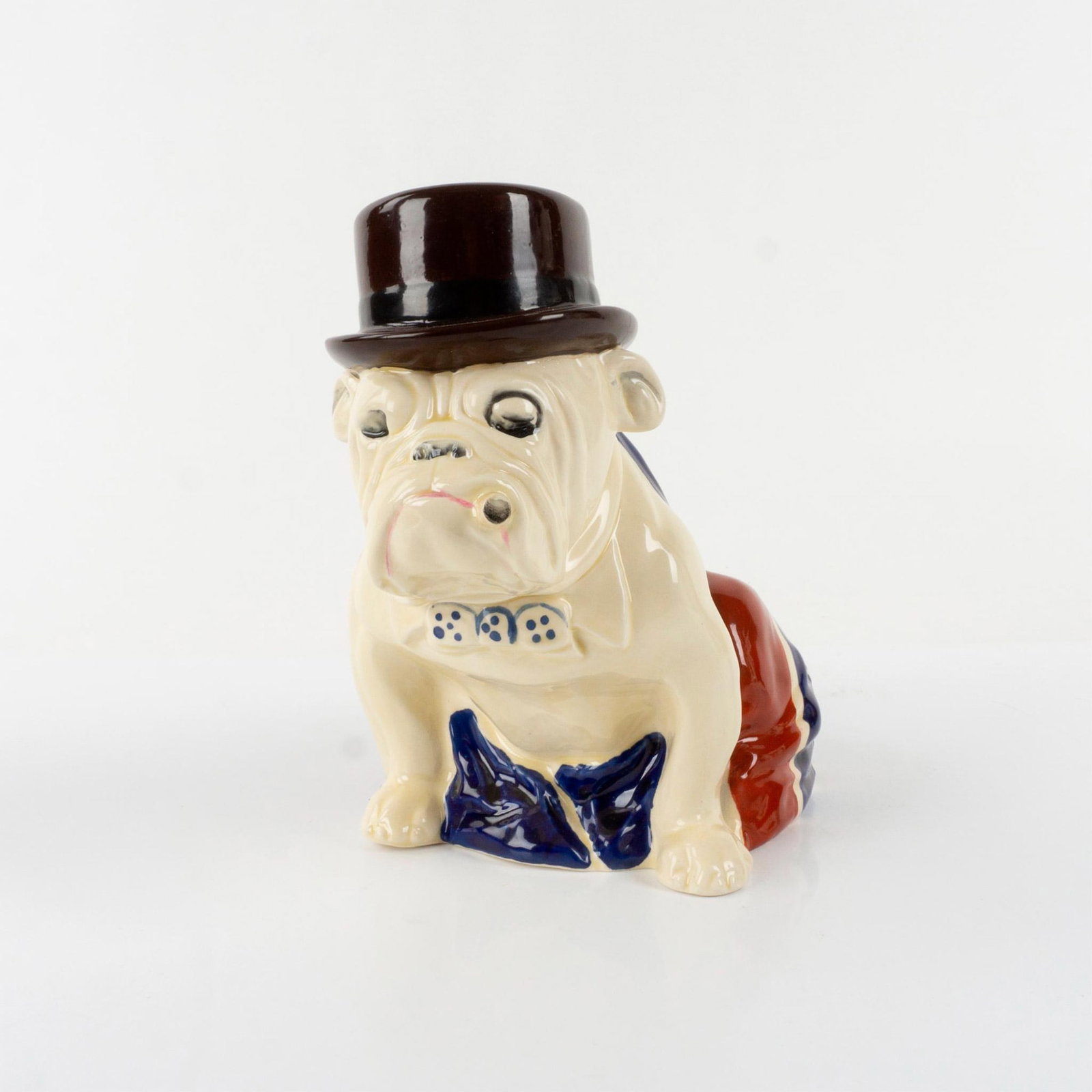 Bulldog D6178 - Royal Doulton Figurine, Unique Colorway: Bulldog Draped in Union Jack with Dark Brown Color Variation Derby Hat. This beautiful bulldog was made to celebrate Winston Churchill and England?s tenacity during the war. The British Bulldog inspir