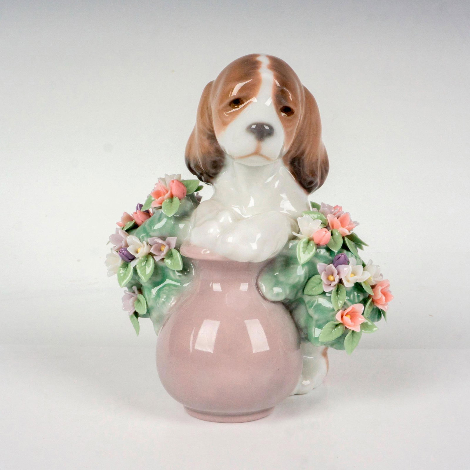 Take Me Home! 1006574 - Lladro Porcelain Figurine: Glossy finish; Lladro backstamp. Includes original box. Box measures: 5.5"L x 6"W x 4.5"H. Artist: Juan Huerta Issued: 2000 Dimensions: 4.25"H x 3.5"W Manufacturer: Lladro Country of Origin: Spain