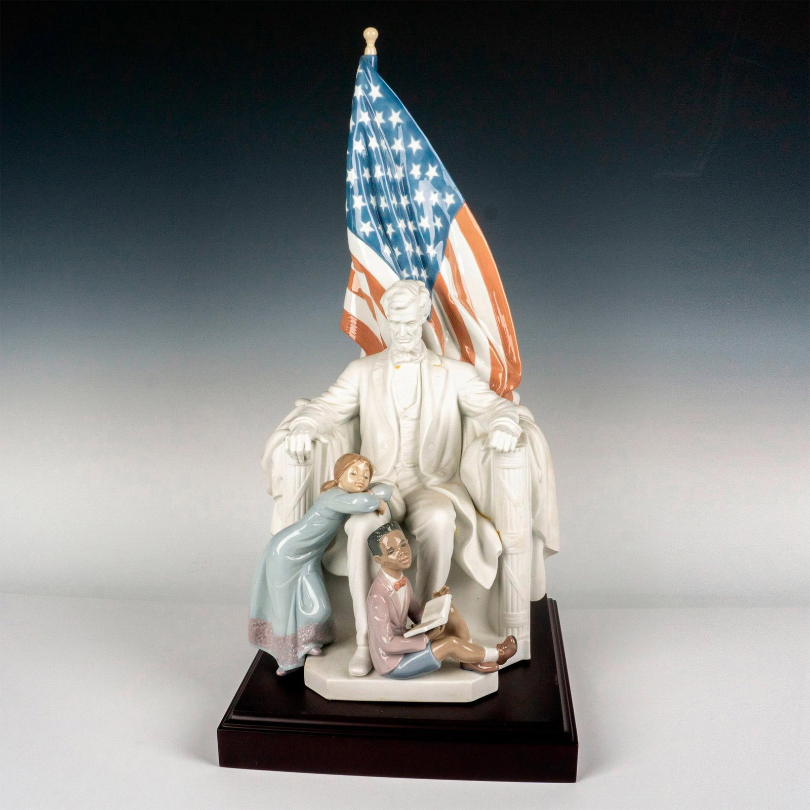 Abraham Lincoln 1007554 Ltd. - Lladro Porcelain Figurine: Glossy finish; Lladro backstamp. Includes Certificate of Authenticity. Includes original box which measures 32"L x 16"W x 17"H. Includes base. Artist: Jose Puche Issued: 1995 - 2008 Dimensions: 21.25"