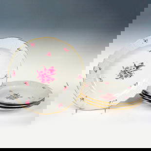 Set of 4 Herend Porcelain Pink Bouquet Dinner Plates: Four ceramic plates with hand painted pink floral patterns and gilt rims. Herend backstamps on bottoms. Dimensions: 10"dia. Manufacturer: Herend Country of Origin: Hungary