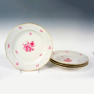 Set of 4 Herend Porcelain Pink Bouquet Dinner Plates: Four ceramic plates with hand painted pink floral patterns and gilt rims. Herend backstamps on bottoms. Dimensions: 10"dia. Manufacturer: Herend Country of Origin: Hungary