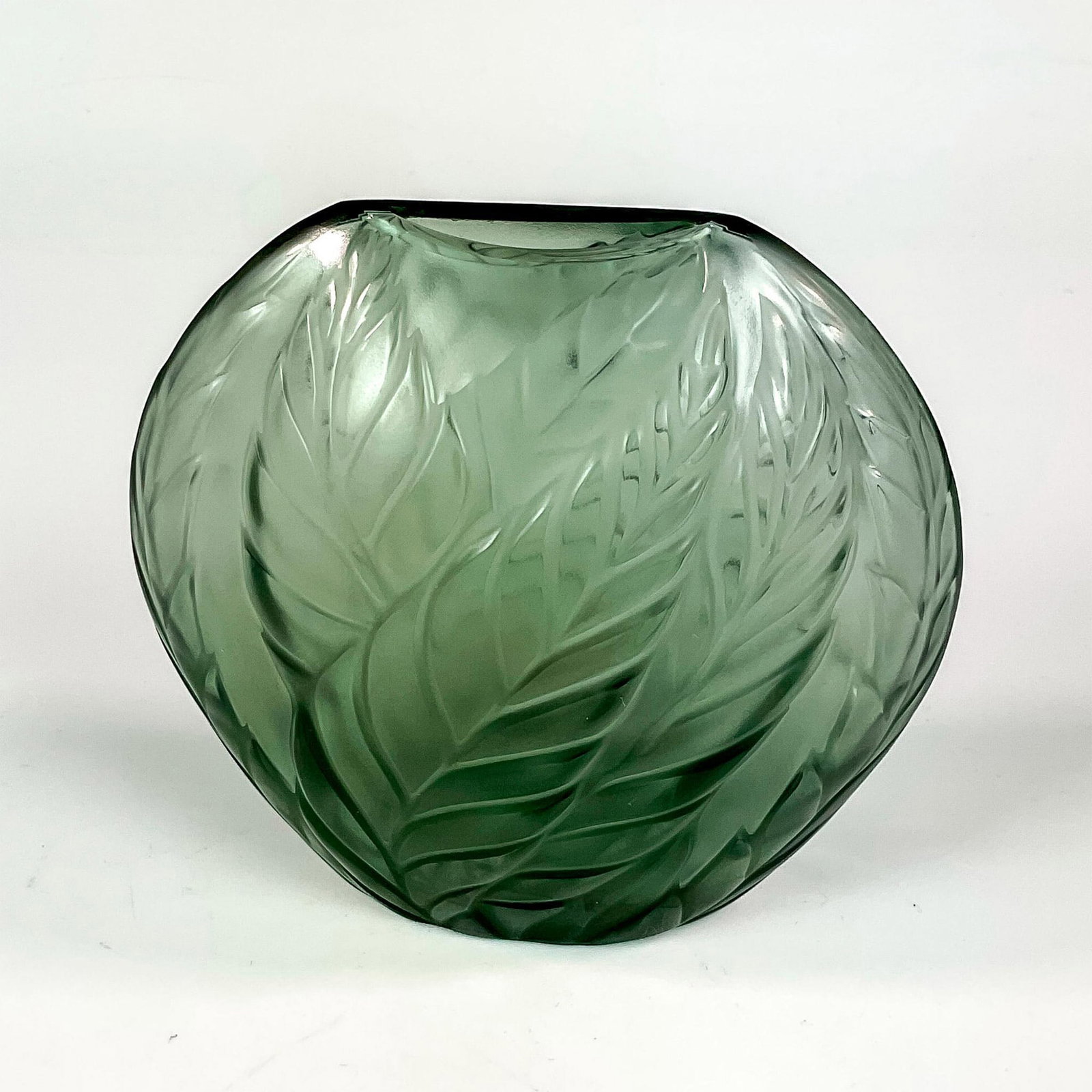 Lalique Crystal Vase, Filicaria: A gris colored frosted and clear vessel of pillow form, decorated with filicaria leaves. Marked Lalique France to underside. Dimensions: 4.5"W x 4.5"H Manufacturer: Lalique Country of Origin: France P