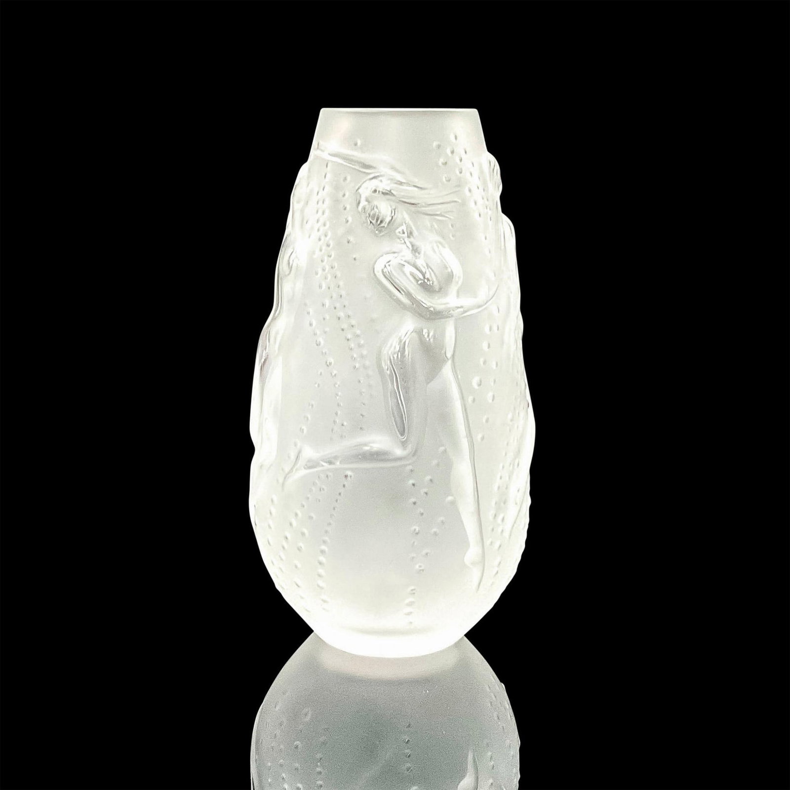 Lalique Crystal Vase, Nymphes: A small clear and frosted vase with dancing nude ladies and dotted design. Lalique France etched on base. Dimensions: 3"W x 5.5"H Manufacturer: Lalique Country of Origin: France Provenance: Marie-Clau