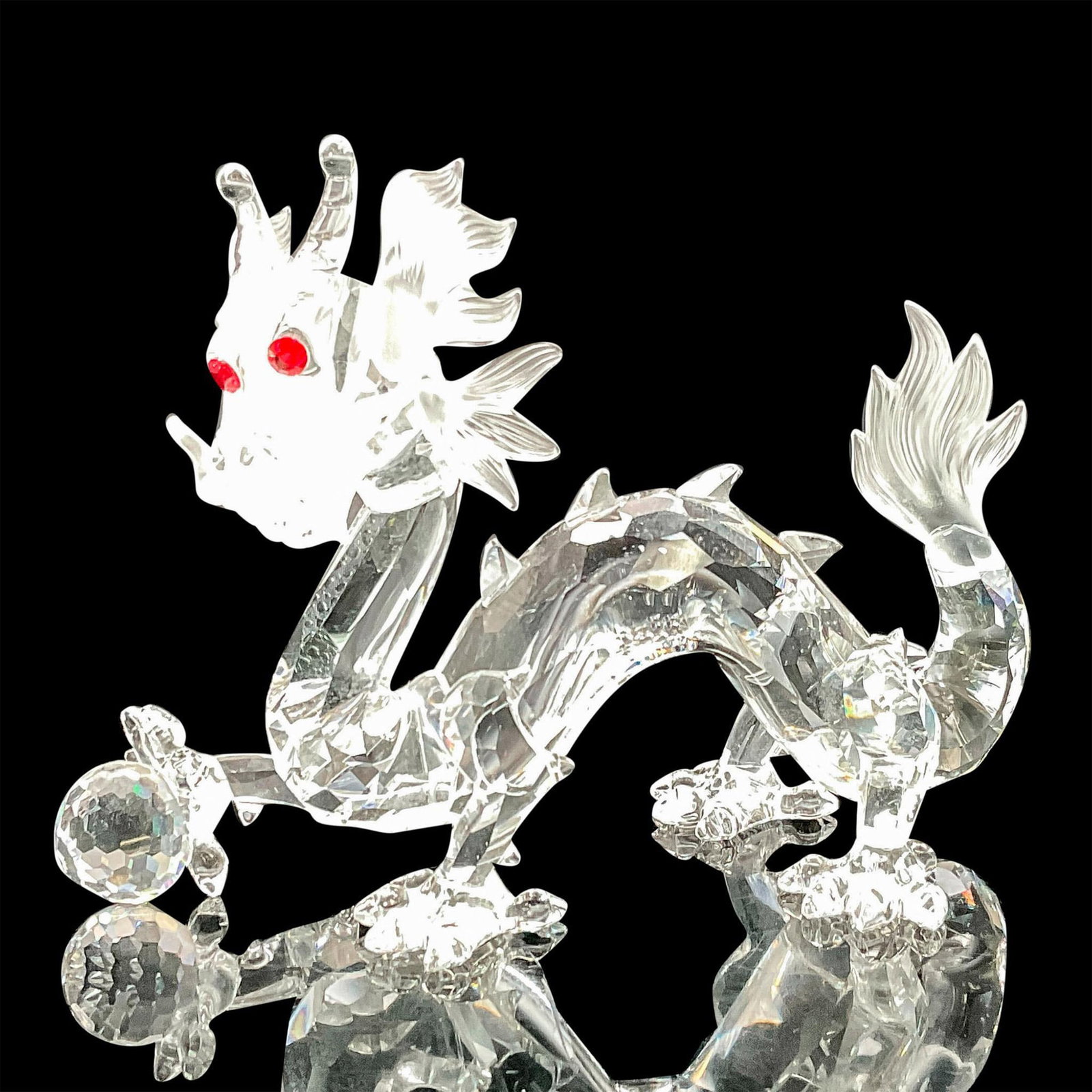 2pc Swarovski Crystal Figurine + Gloves, Dragon: Annual edition lead crystal part of the Fabulous Creatures series and is made with frosted crystal tail and plume. Includes Swarovski handling gloves. Swarovski etched backstamp. Certificate of Authen