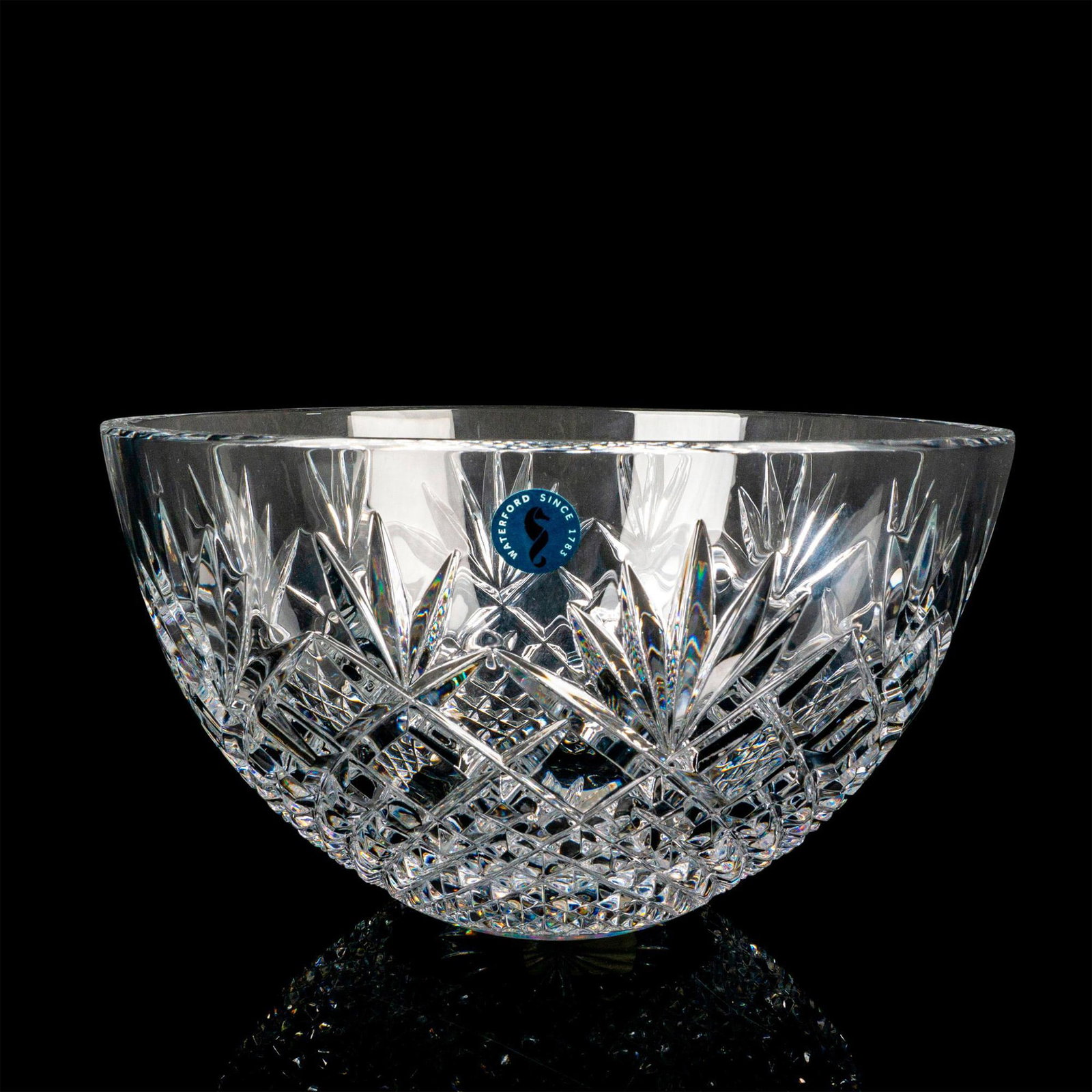 Waterford Crystal Bowl, Sullivan: This Waterford Crystal Bowl in Sullivan pattern features cross and fan cuts. The bowl can be used for holiday entertaining or as home decor. This item has its original box which measures 11"L x 11"W x