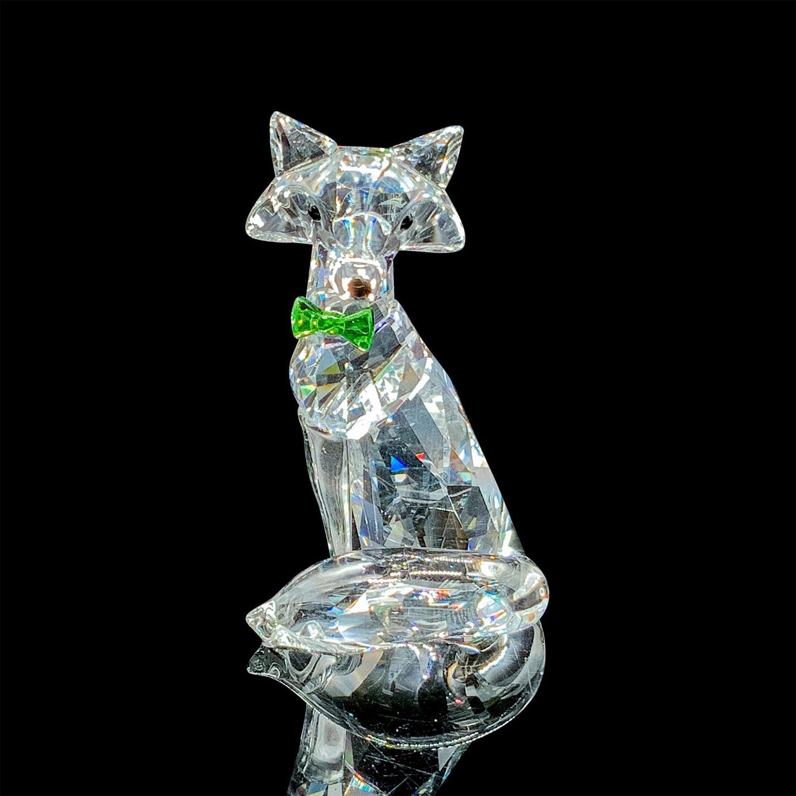 Swarovski Crystal Figurine, SCS Gift Arctic Fox: 2019 Swarovski Crystal Society Loyalty Gift. Adorable faceted clear crystal fox wearing a green crystal bow tie. Swarovski acid mark on the bottom. Made in Liechtenstein. Item has original box that me