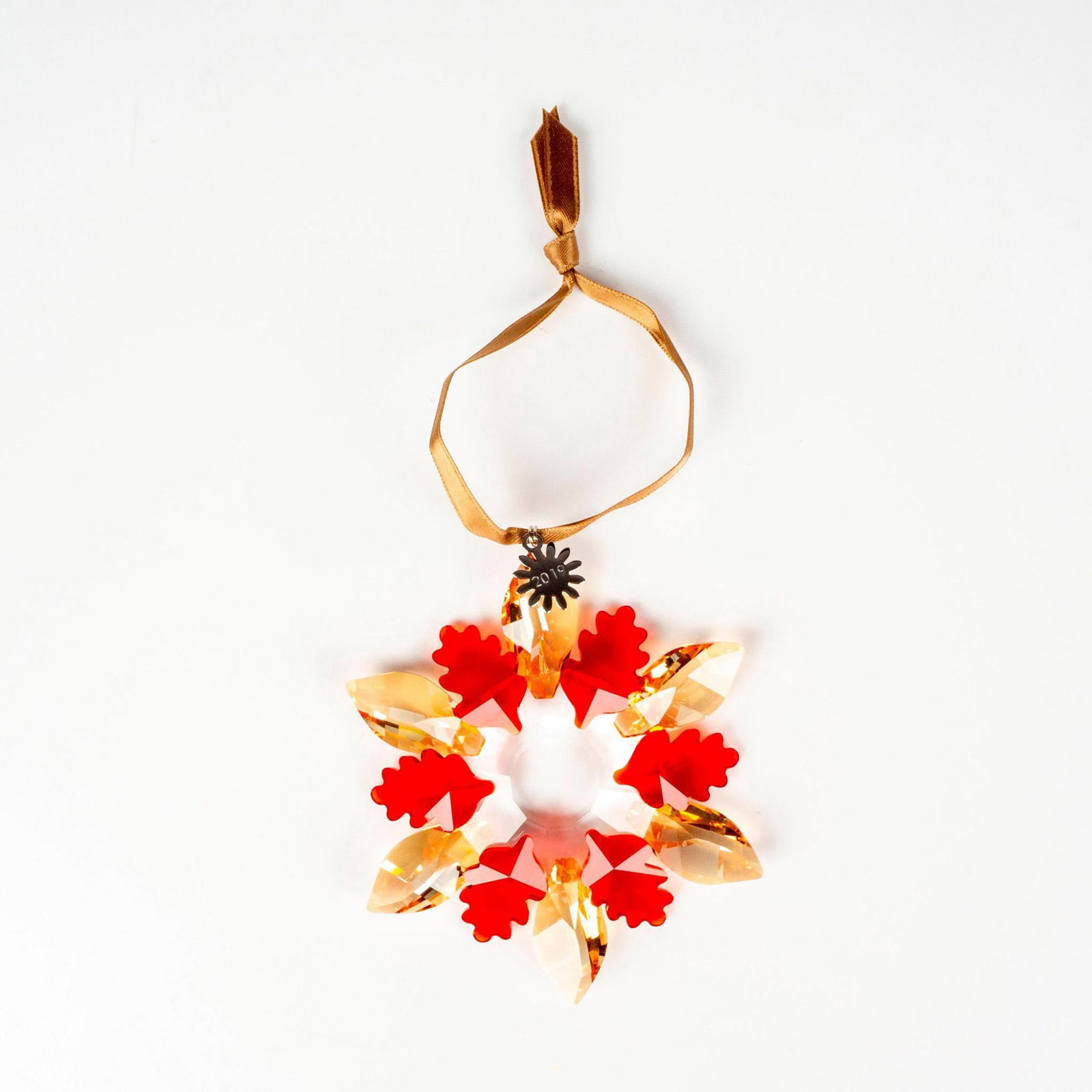 Swarovski Crystal Ornament, Winter Sparkle: Lead crystal part of the Christmas Ornament collection, made from golden shadow crystal. Swarovski etched backstamp. This item has its original box. Box measures: 5.75”L x 5.75”W x 2.5&rdq