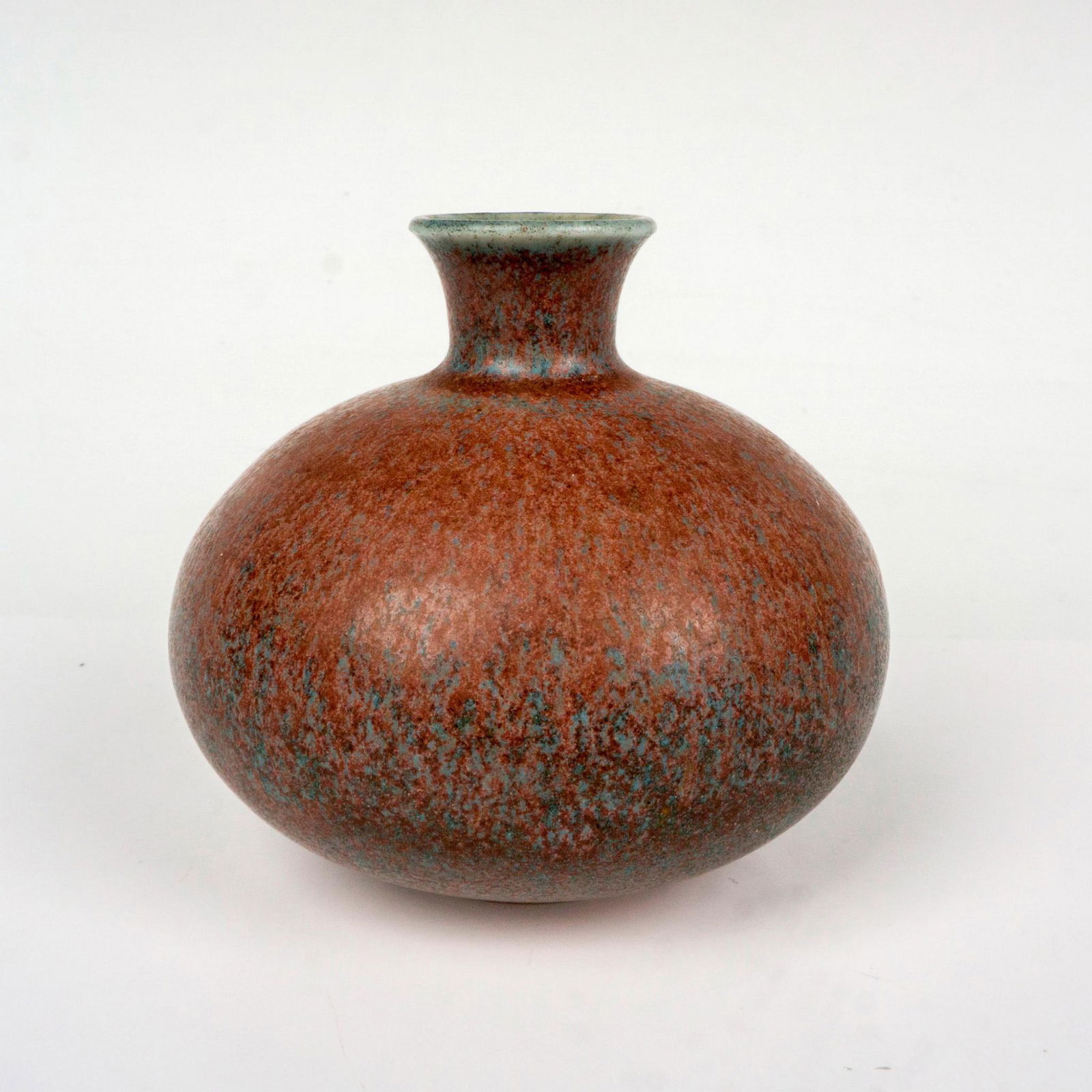 Rorstrand Gunnar Nylund Mini Ceramic Bud Vase: A tiny and cute vessel in a glaze multicolored pattern. Signed G. N. to underside. Rostrand backstamp. Artist: Gunnar Nylund Dimensions: 2.75"W x 2.5"H Manufacturer: Rorstrand Country of Origin: Swede